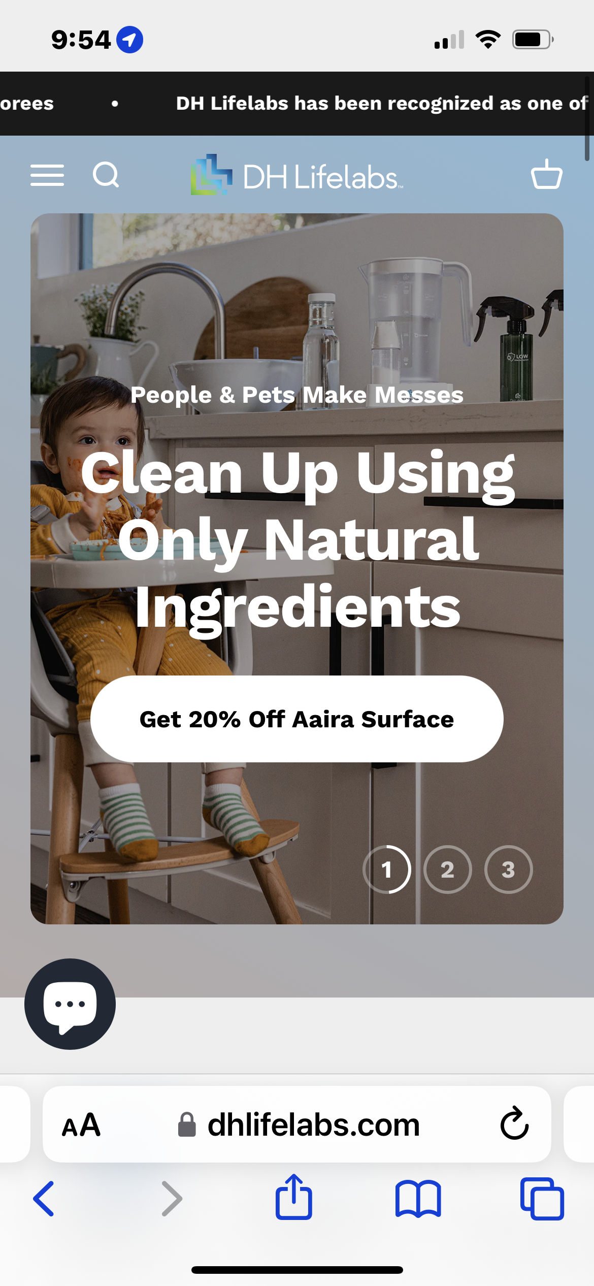 Website homepage promoting natural cleaning products with a baby sitting in high chair in a modern kitchen.