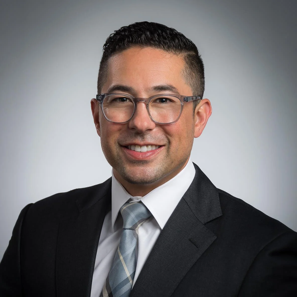 Professional man wearing a suit with glasses