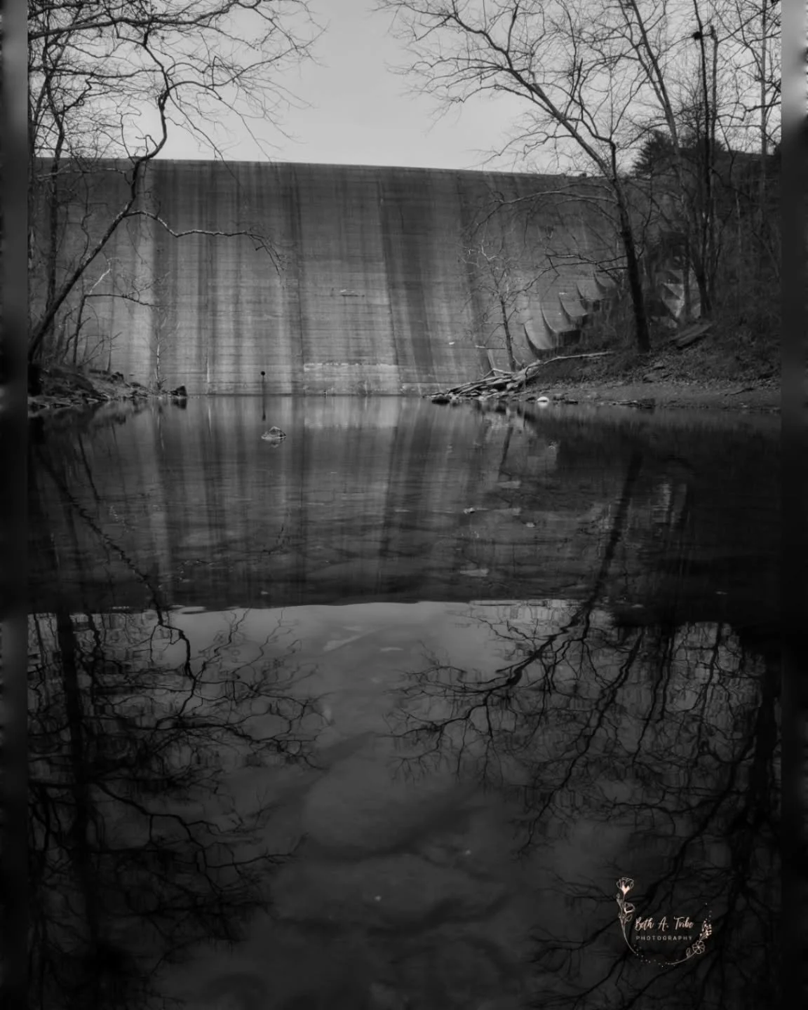 "Stillness at the Divide"

Another shot I wouldn't be able to get if it wasn't for the drought we are in. Literally standing in the middle of the Patapsco River to capture the back of Liberty Dam. 

#libertydam 
#pvsp
#patapscovalleystatepa