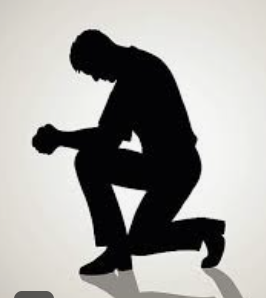 Man kneeling to pray