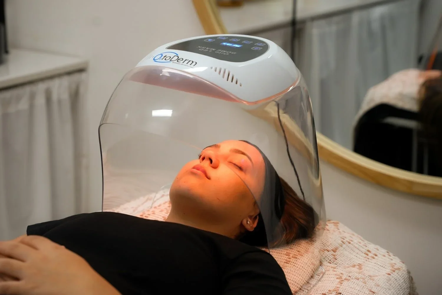 Woman getting a glass skin oxygen facial