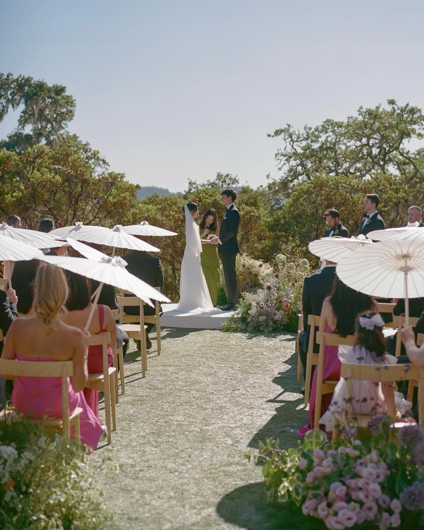 From a sun-drenched ceremony in Sonoma, where native plants and a naturalistic garden design bloomed with bursts of vibrant tones, to a magnetic, moody after-party reminiscent of a night out in Hong Kong, C + A&rsquo;s wedding was a seamless fusion o