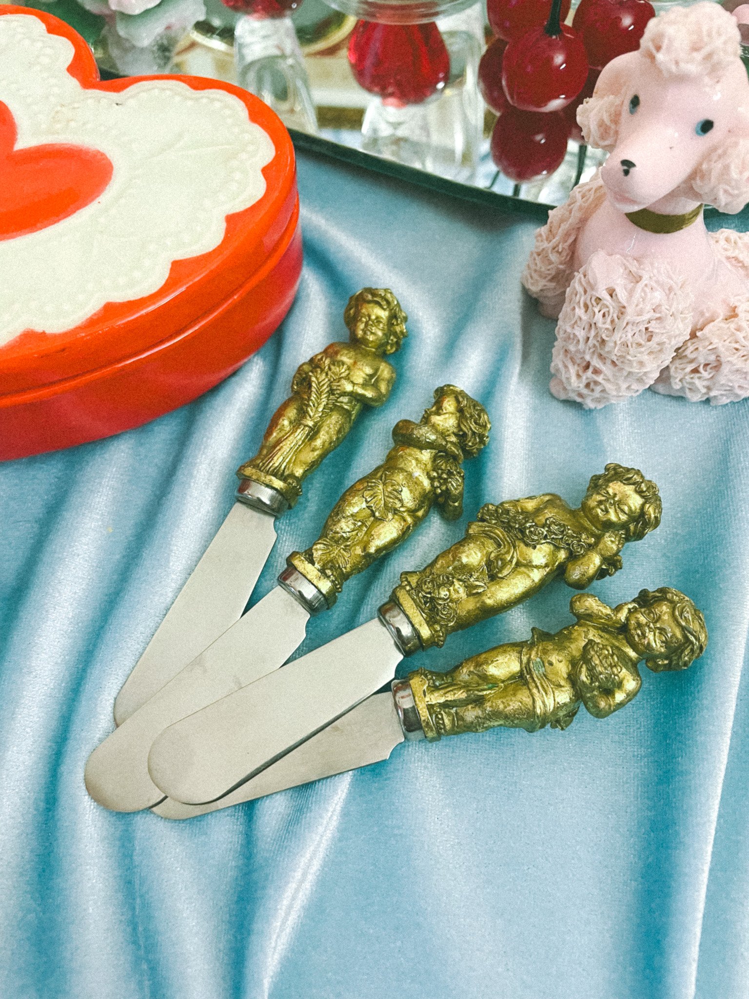 *NEW* resin cherub cheese knives