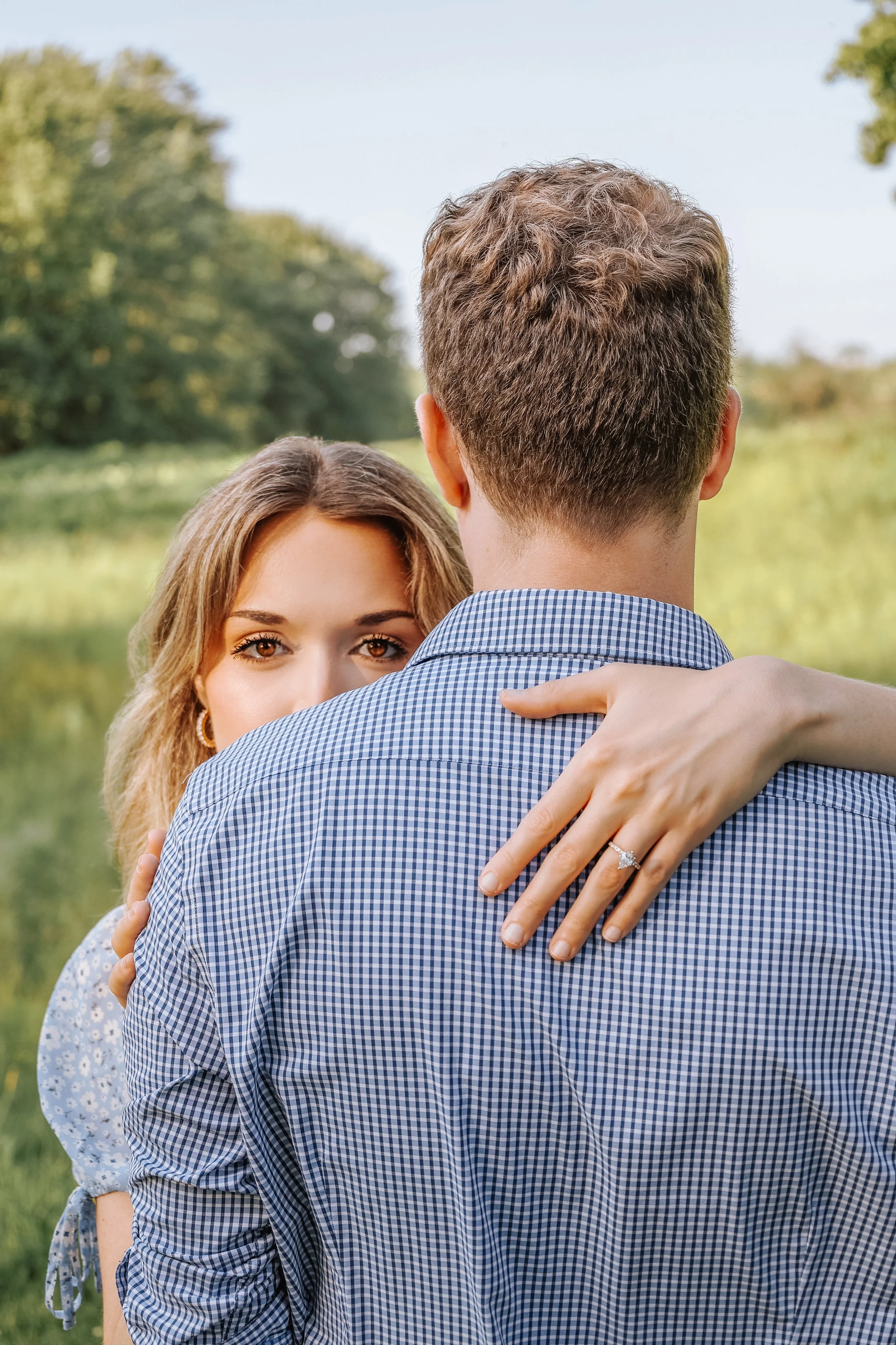 photographer in Buffalo NY capturing a couple newly engaged