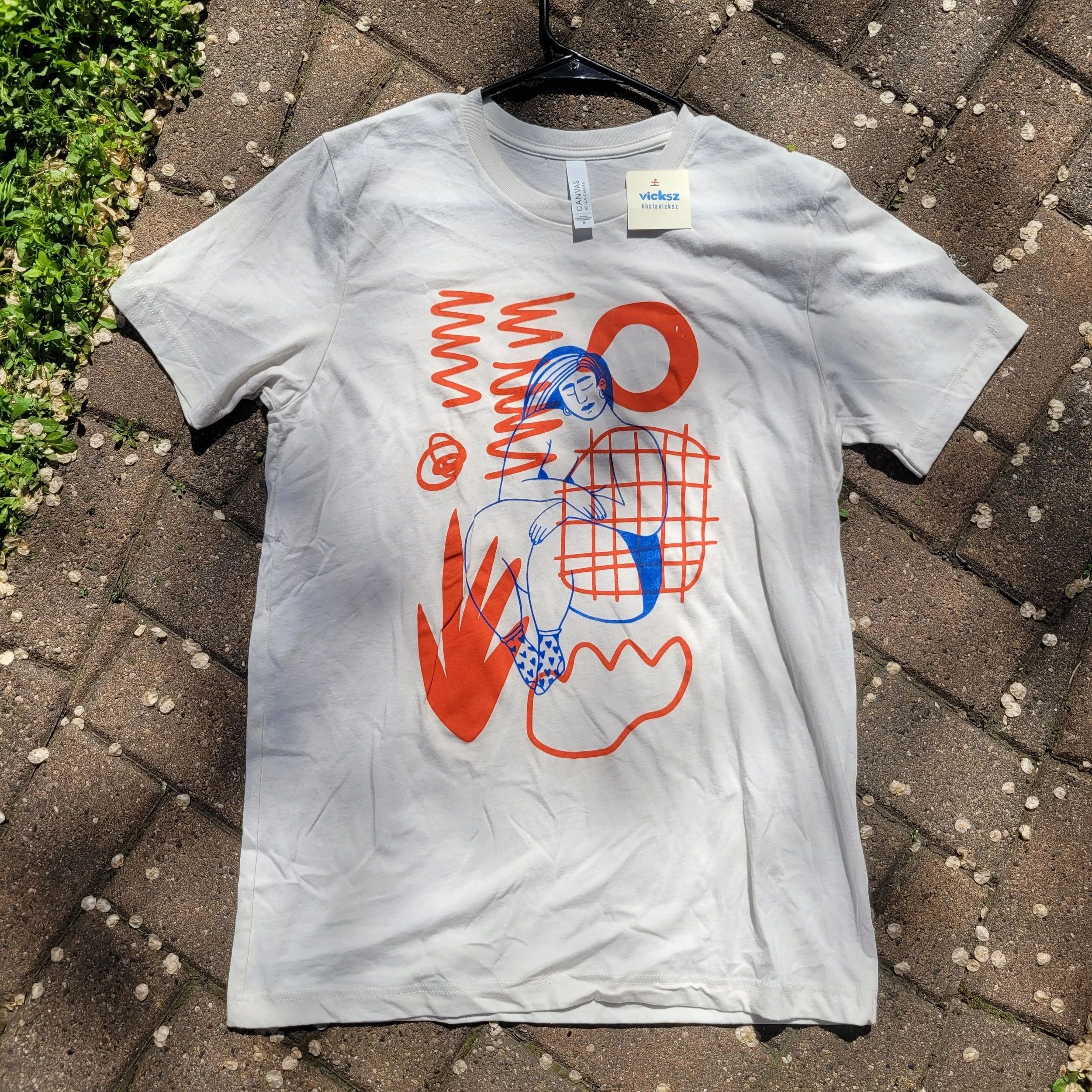 Vintage White "Heart Socks" T-shirt with red background- size M