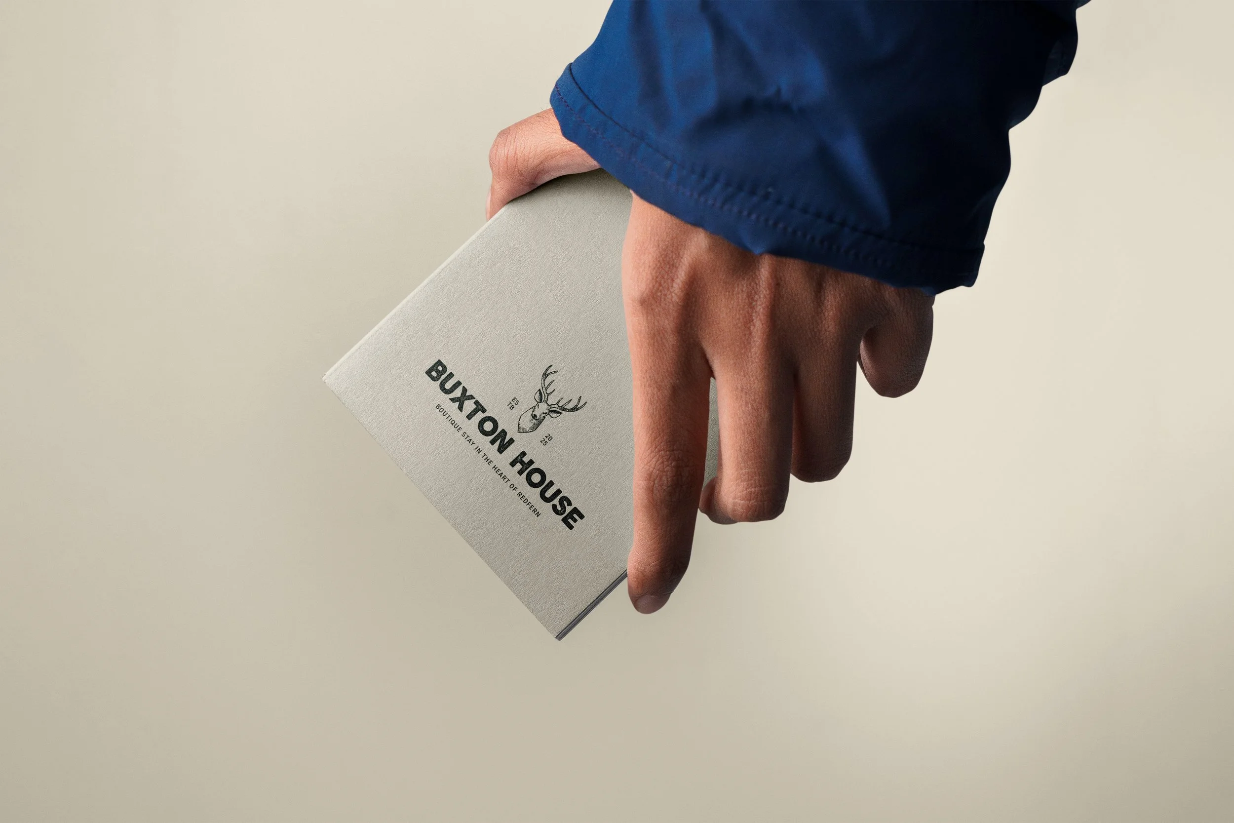 Free A5 Notebook in Hand Mockup2 copy.jpg