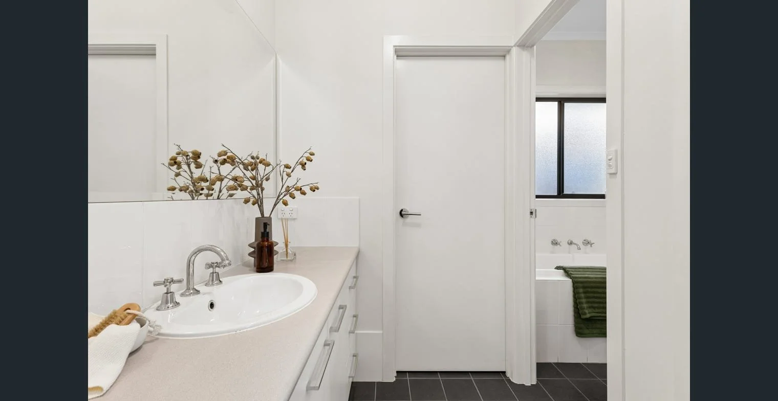 Stunning bathroom with seperate toilet and bath - serenity homes and design 
