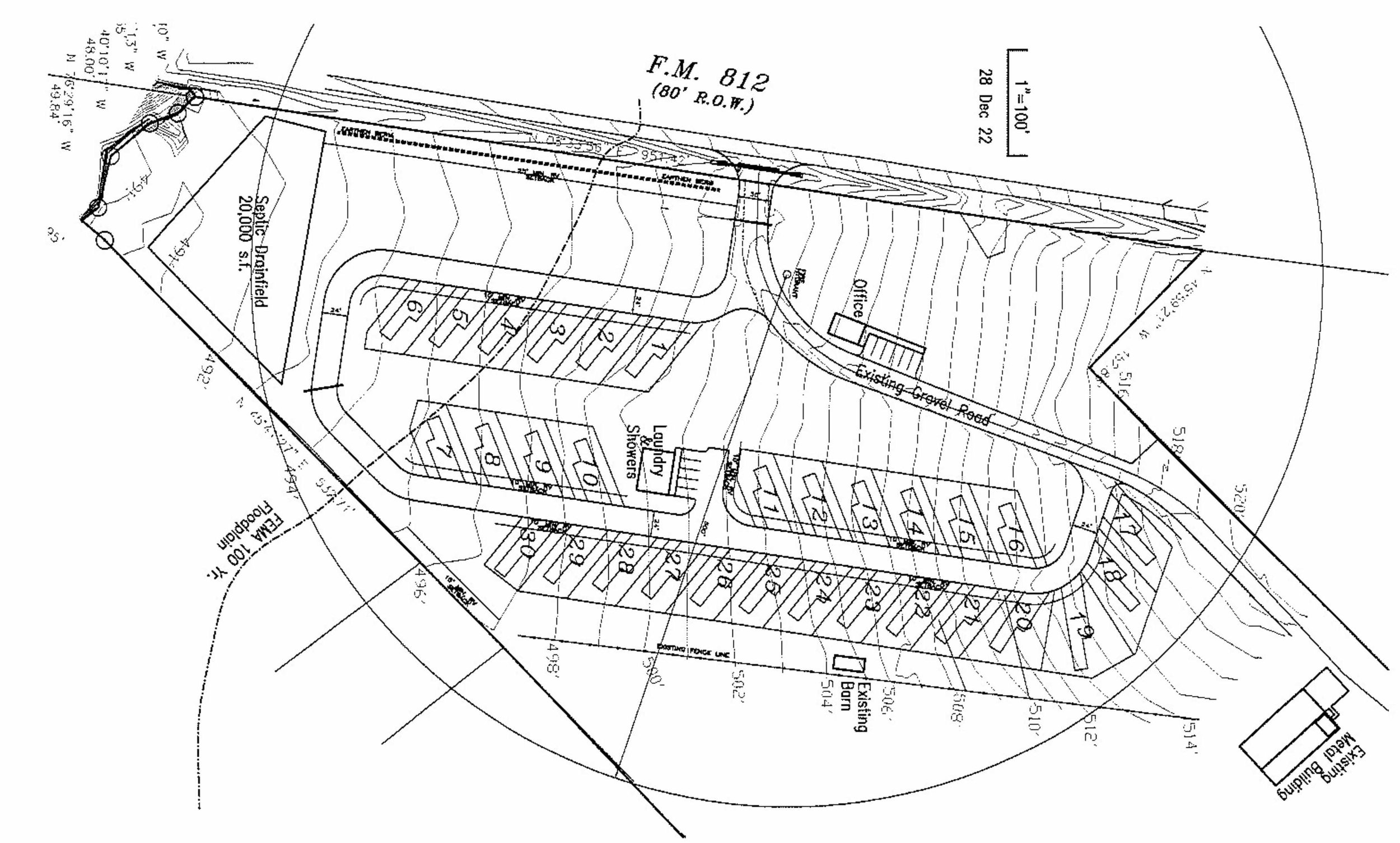 A site plan showing a layout of a property with labeled features including septic drainfield, laundry and showers, office, and an existing gravel road. There are designated lot numbers and several building outlines. Contour lines indicate elevation changes, and the plan includes measurements and directional indicators. The title mentions F.M. 812.