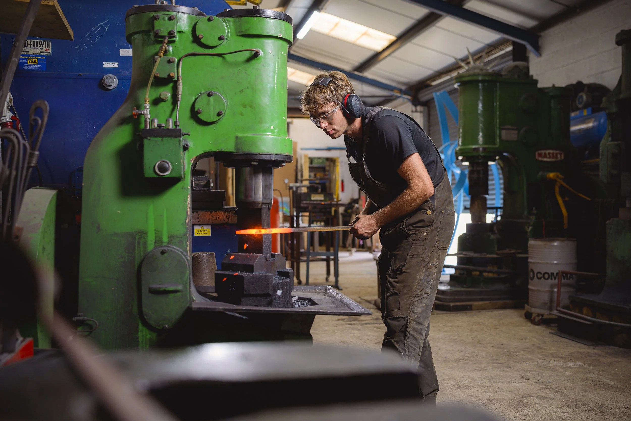 using the power hammer to move metal into shape
