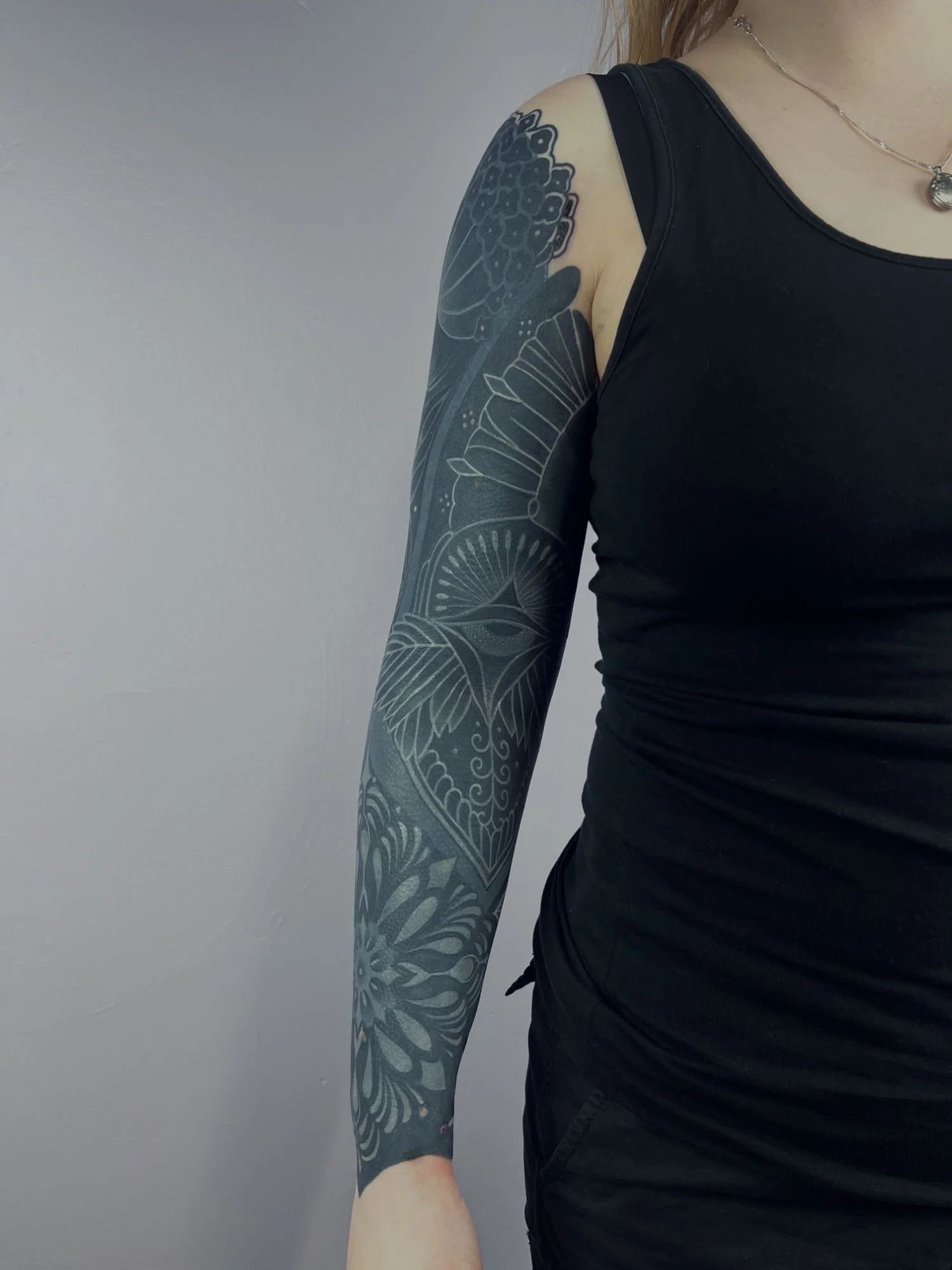 Black out_white on black tattoo.jpg