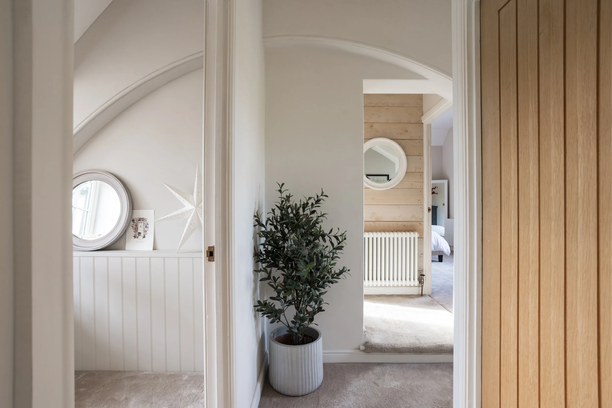 one point perspective of landing looking through doorways