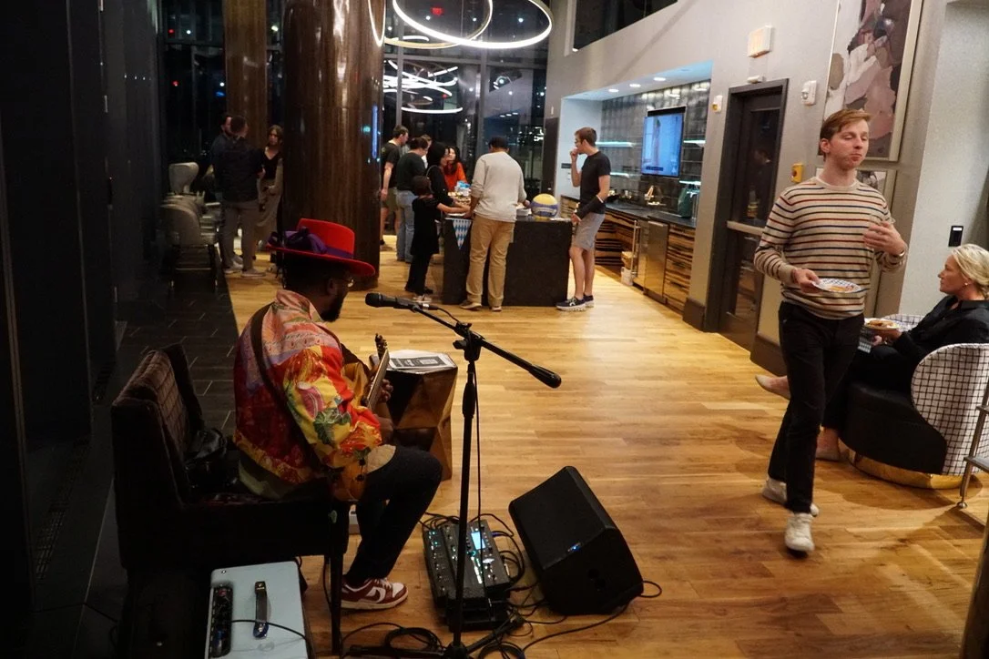 Solo guitarist performing during a fall resident event at The Sudbury.