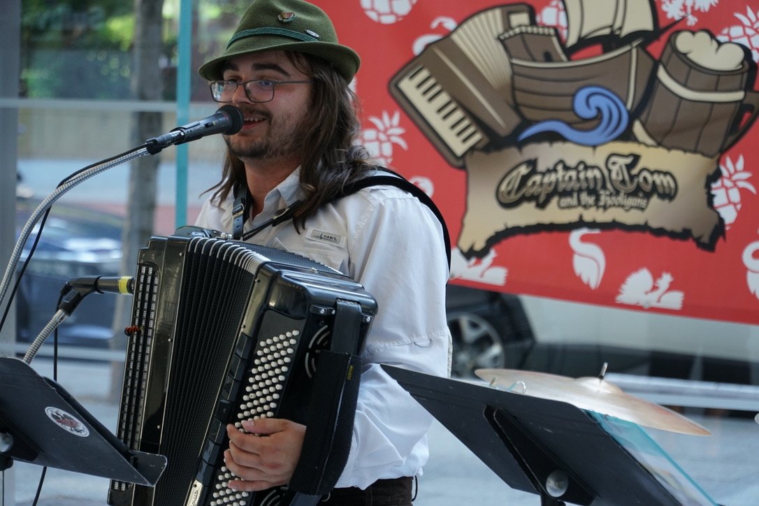 Oktoberfest live music transforming the lobby at One Post Office Square