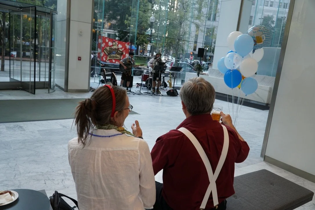 Tenants enjoying live Oktoberfest music at One Post Office Square in Boston