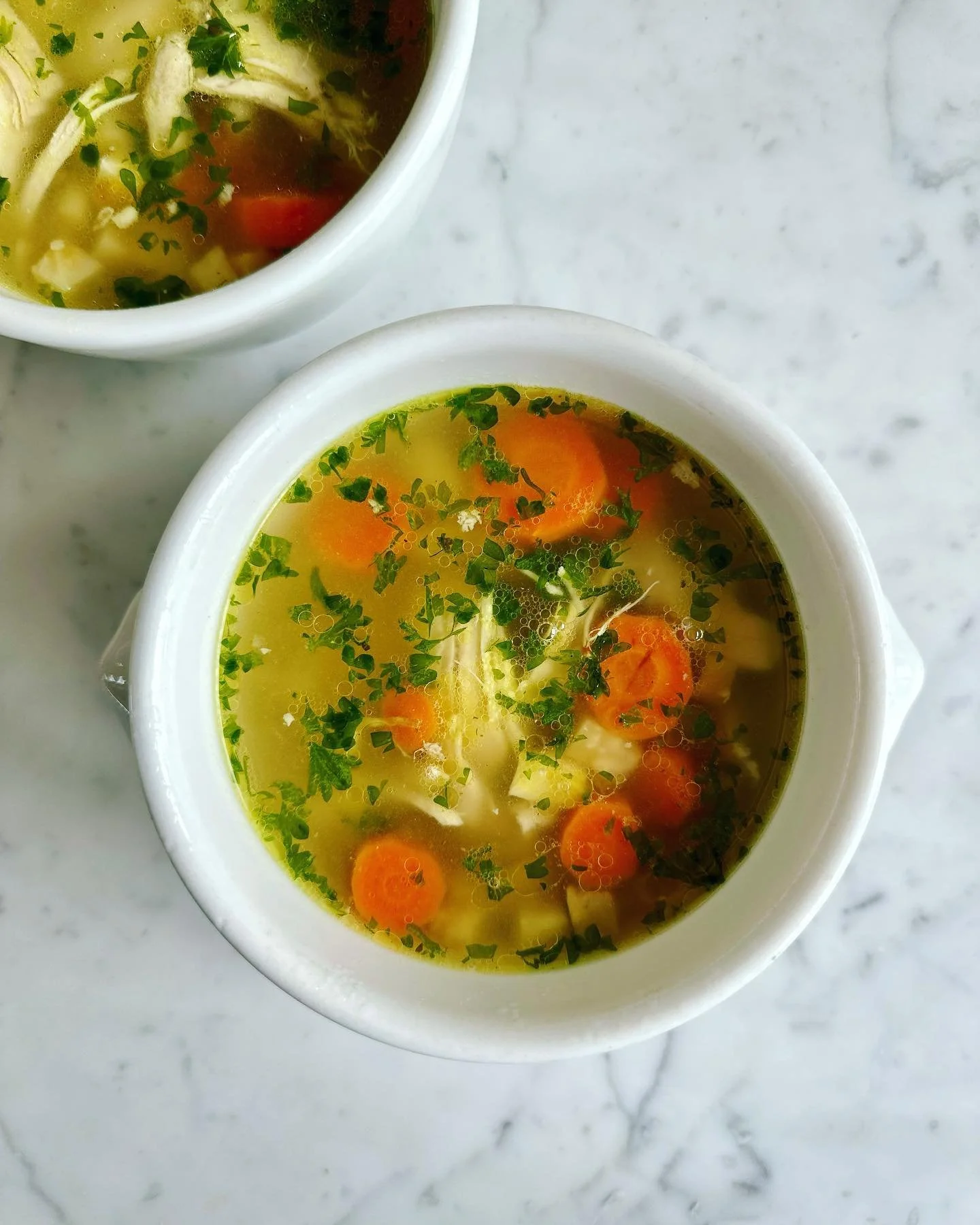 Chicken Soup
Serve as is or with a warm chicken pie 

Ingredients:
- 1 whole chicken, skin removed
- 10 cups water
- 2 medium onions, quartered
- 2 carrots, whole
- 1/2 celery root, quartered
- 4 celery stalks
- 3 cloves garlic, minced
- 2 bay leaves