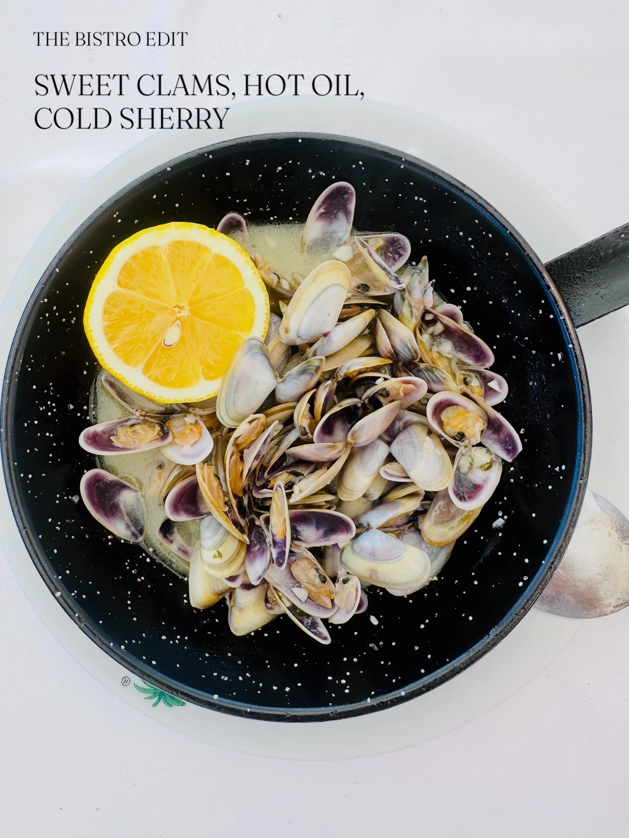 Sweet, purple wedge clams flashed in hot olive oil, sizzling garlic, and dry Manzanilla sherry until they burst open in their own briny liquor. Finished with fresh lemon and flaky salt.&nbsp; 
Ready in 90 seconds, made for crusty bread. Recipe link i