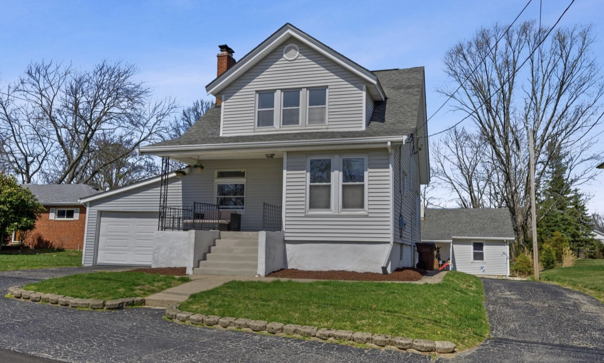 Two story gray home in Blue Ash, a top suburb in Cincinnati, Ohio