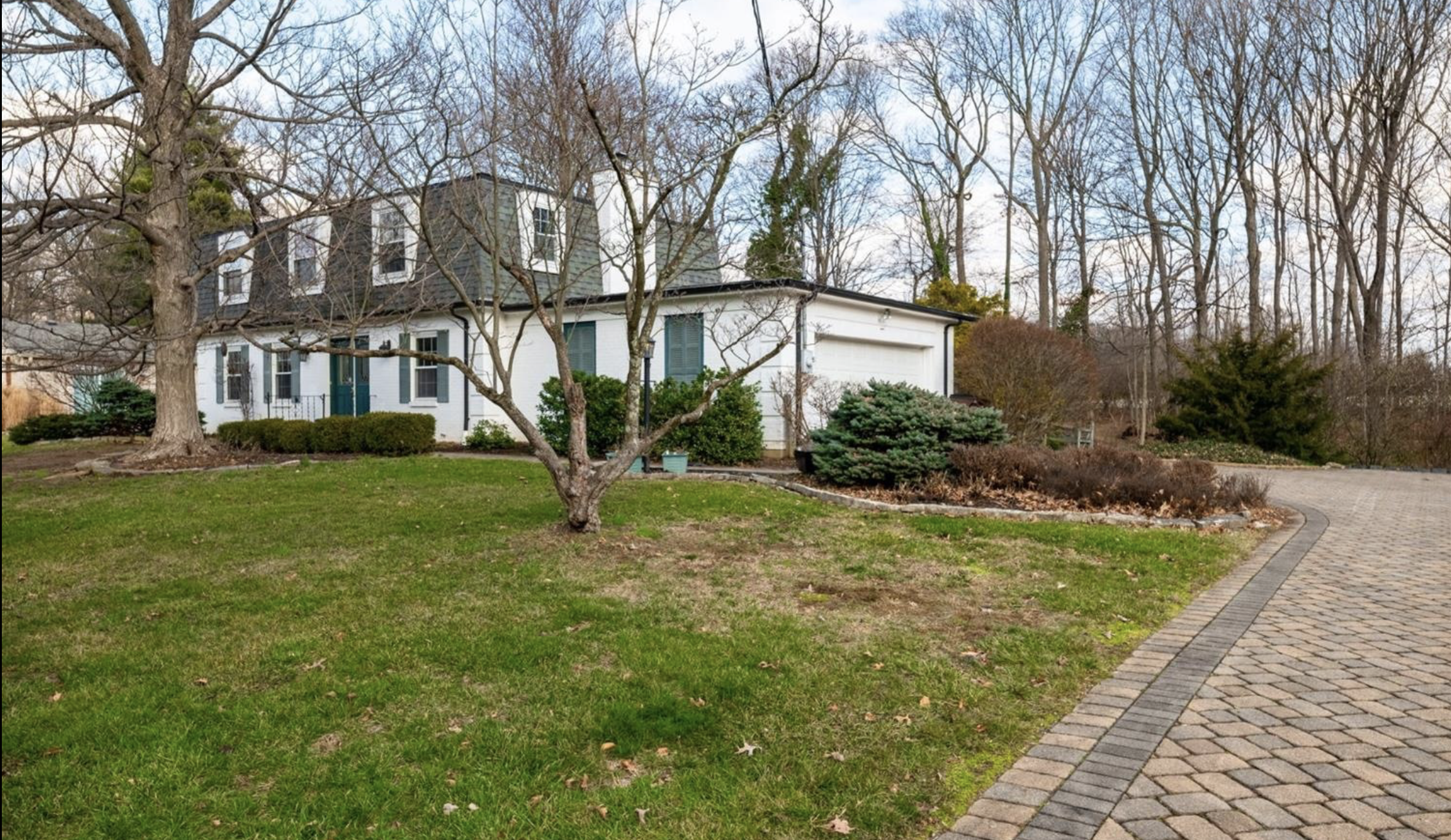 Two story white house in Blue Ash, a top neighborhood in Cincinnati, Ohio