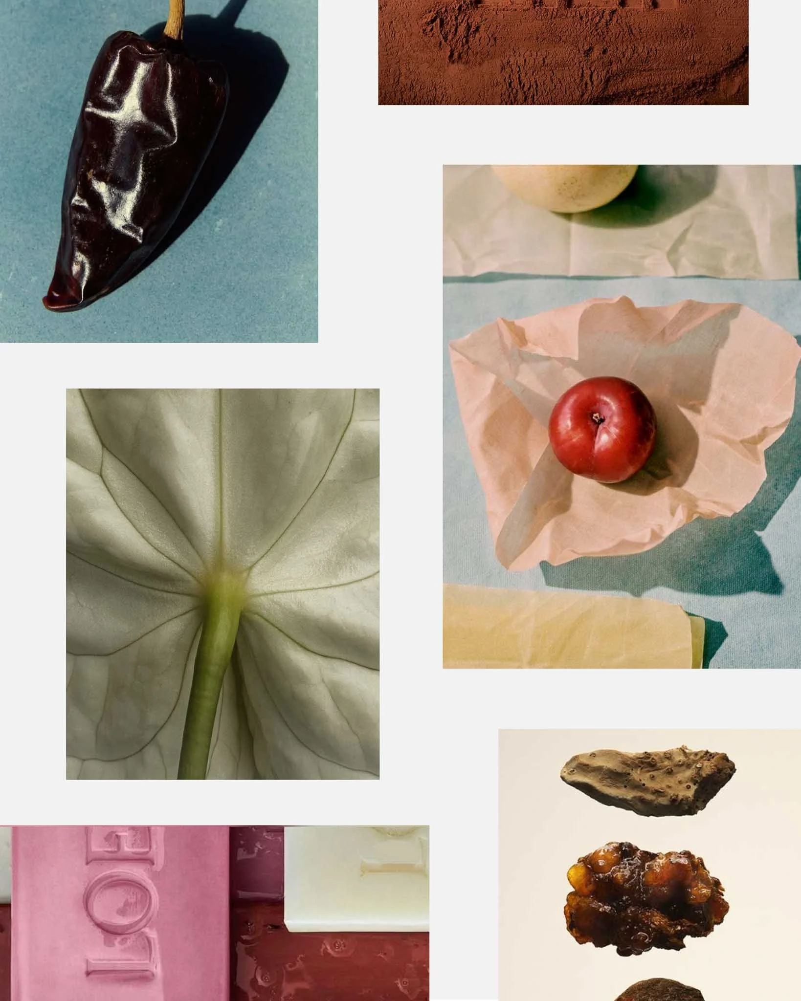A collage of food and textures including a black pepper, cocoa powder, an apple on wrapping paper, a green leaf, a red apple, a piece of ginger, bars of soap, and a bean