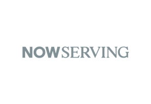 Sign with the text 'NOW SERVING'