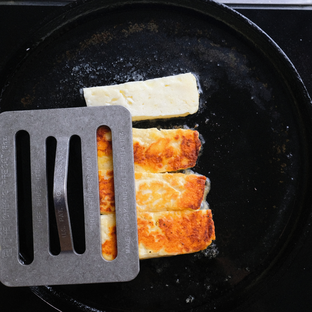 cooking holloumi cheese witht he chef's press.png