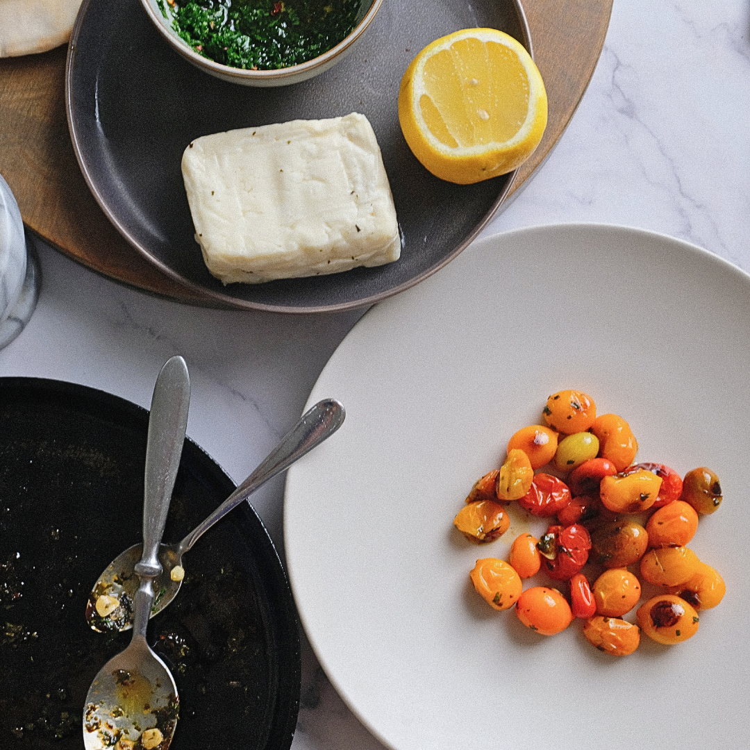 plated chared tomatoes with hollooui cheese and lemon.png