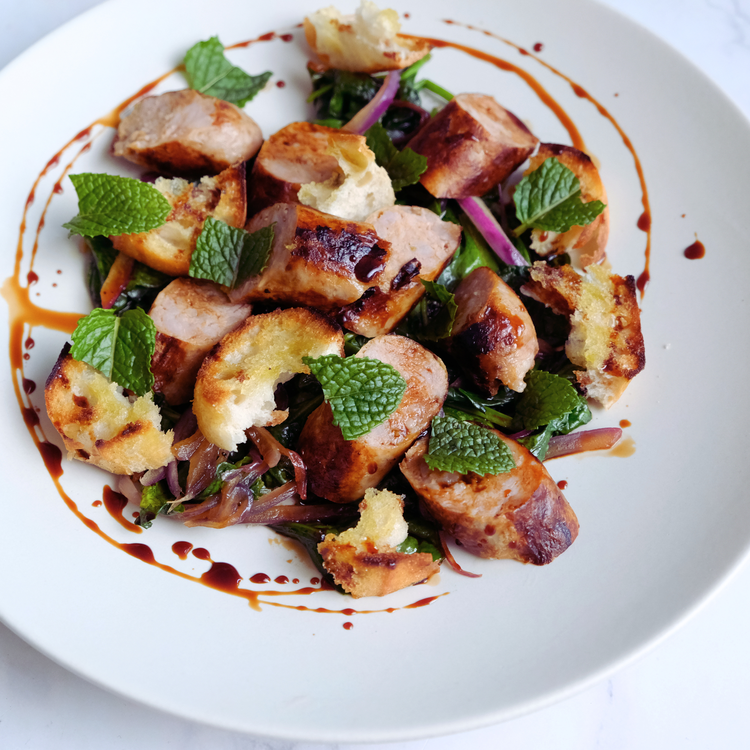 seared sausage salad, balsamic glaze, chefs pressed croutons1.png
