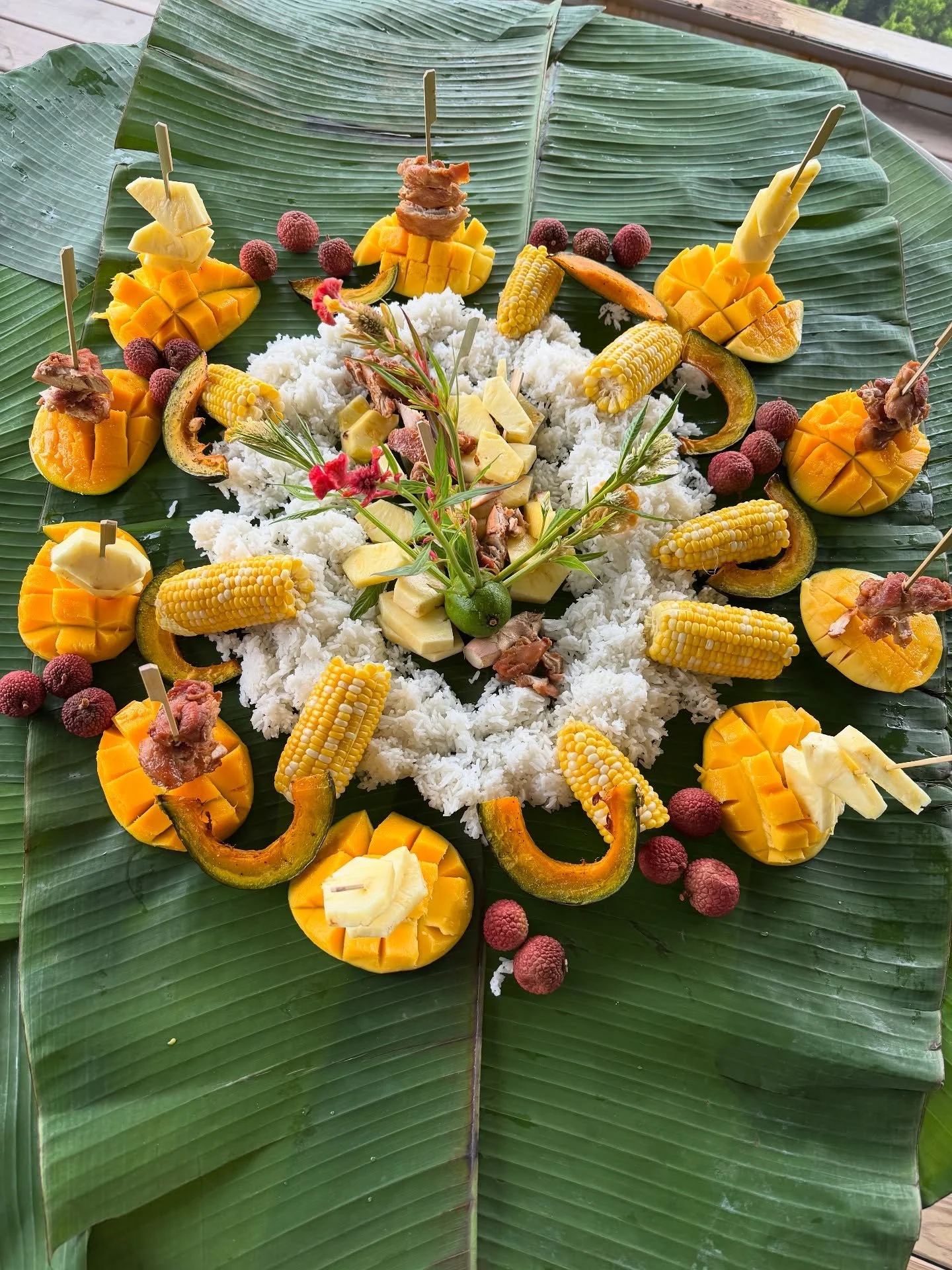 The simplest kamayan inspired by Japanese bamboo skewers. I focused on fruits: ripe mangos, fresh pineapple, and lychee. I made white rice on the stove, boiled fresh corn on the cob and baked some kabocha squash. I included a chicken marinated in Hul