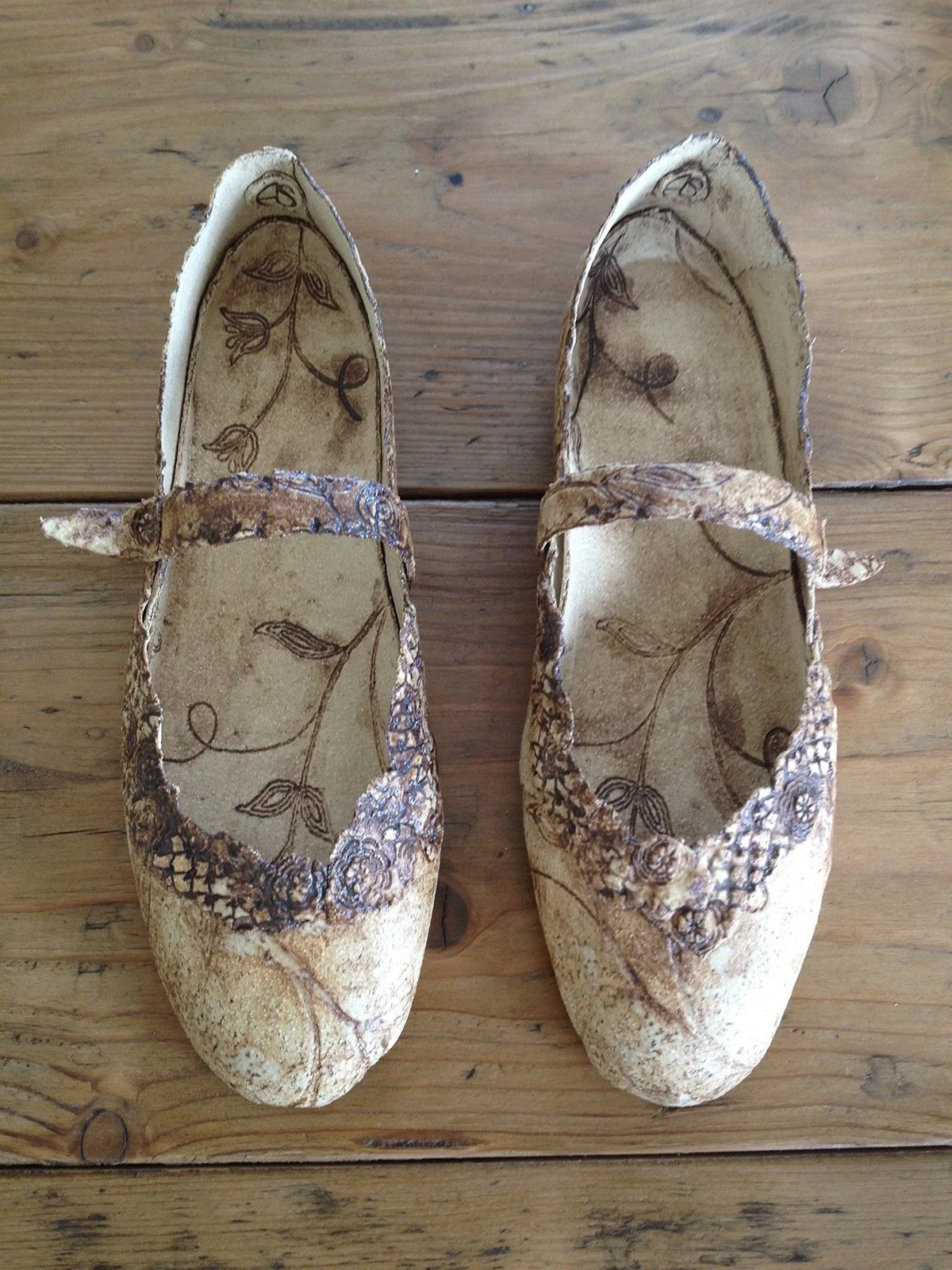  'Reap only what you saw'- Ceramic Shoes(Stoneware clay with oxides and glaze). 