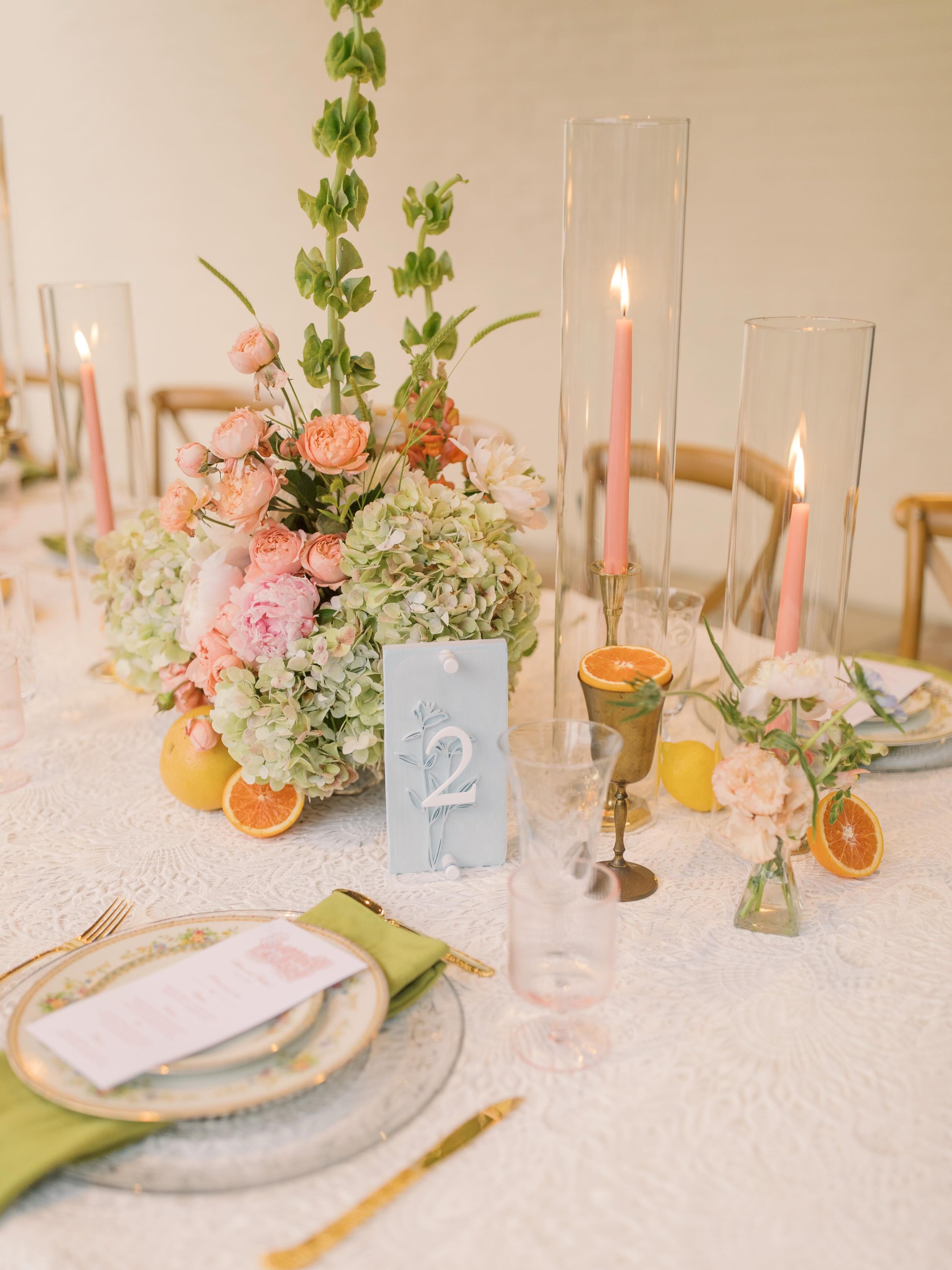 I&rsquo;m loving all the beautiful colorful weddings this year! It makes for the most fun tablescapes with the most unique eye catching details 🍋🌸🕯️

I always say a cool table number can tie the whole thing together like it does here 🤍

#weddingt