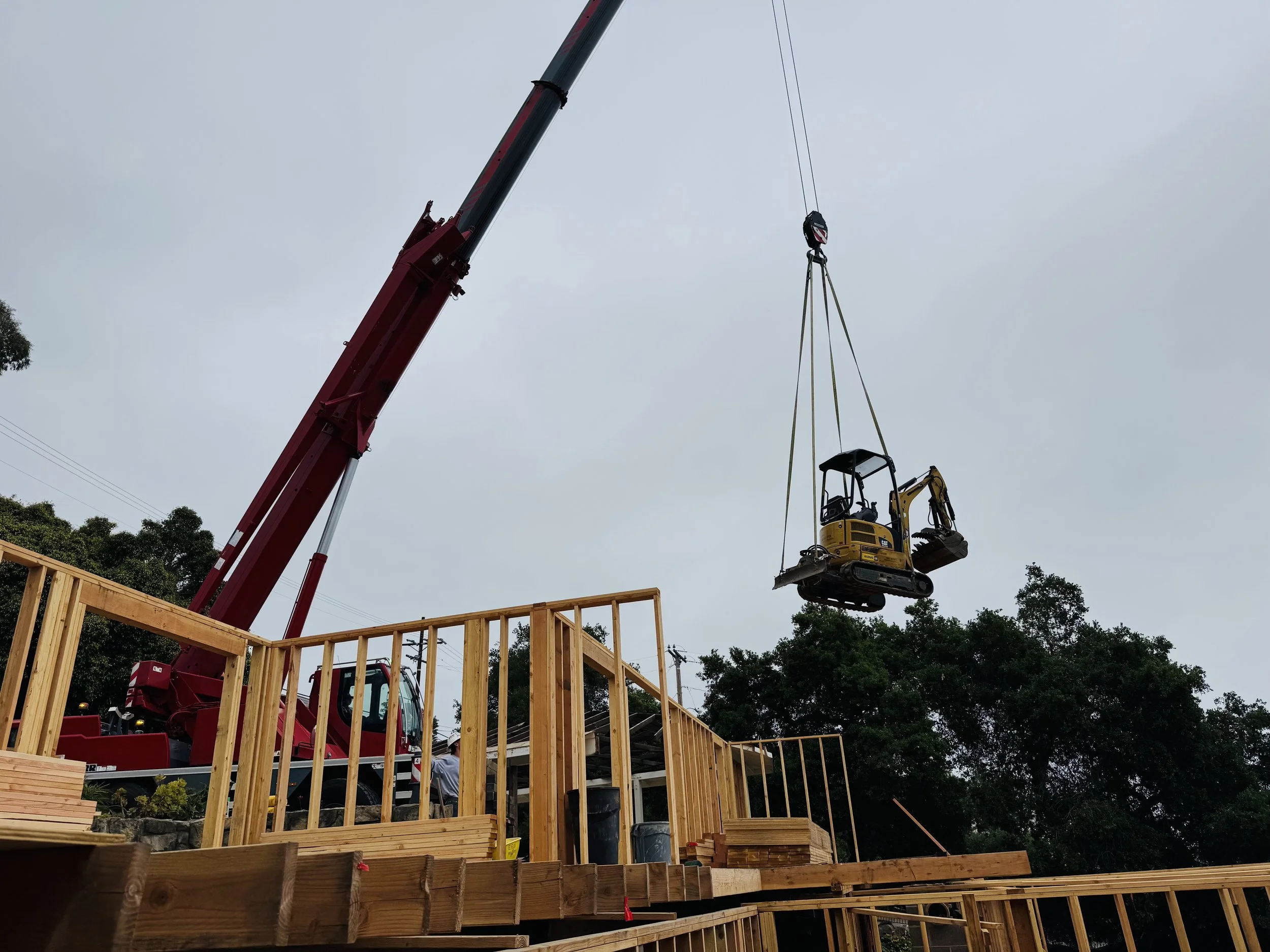 Crane photos 1 over house- Podium Builders Santa Barbara.jpeg