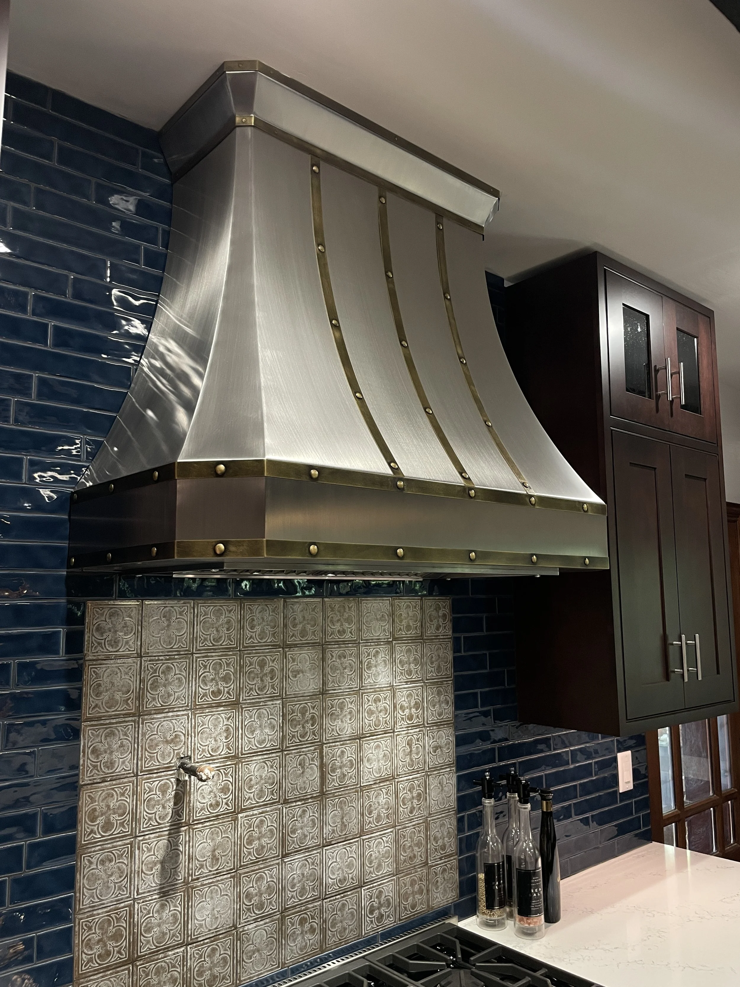 Custom Stainless Steel Range Hood with Bevel Corners and Antique Brass