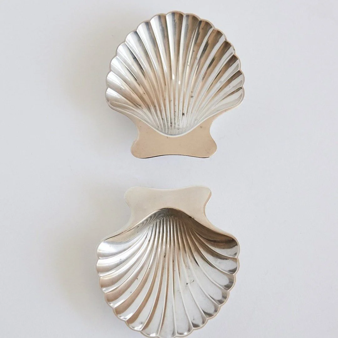 Vintage Tiffany sterling silver shell dishes from the first half of the 20th century. Three available.