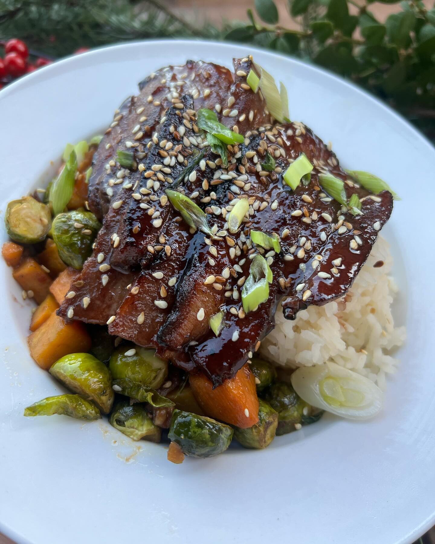 Braised pork belly with cherry miso glaze and a Brussels sprout sweet potato hash