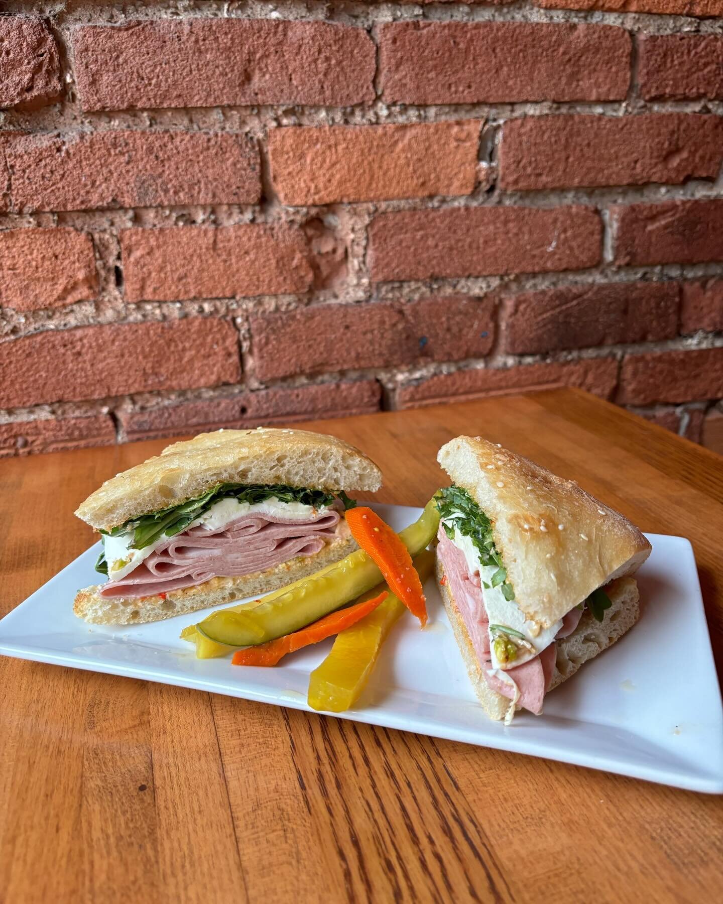 Muffuletta - Sliced Mortadella, Fresh Mozzarella, Arugula, Pistachio Pepper Aioli