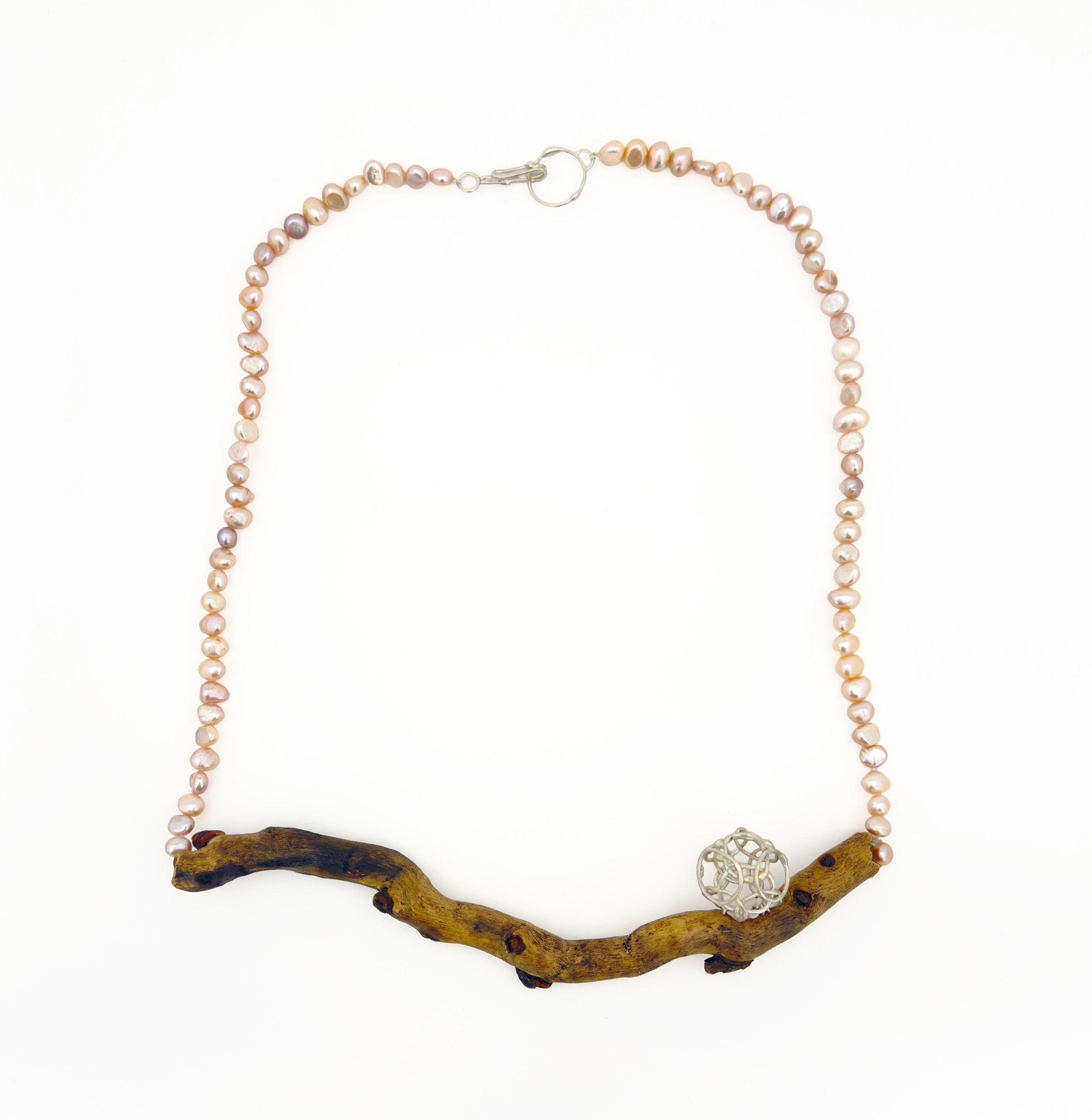 breathe 26 (necklace)
recycled silver, found wood, repurposed natural pearls
9” x 7 ¼” x 7/8”
2026
