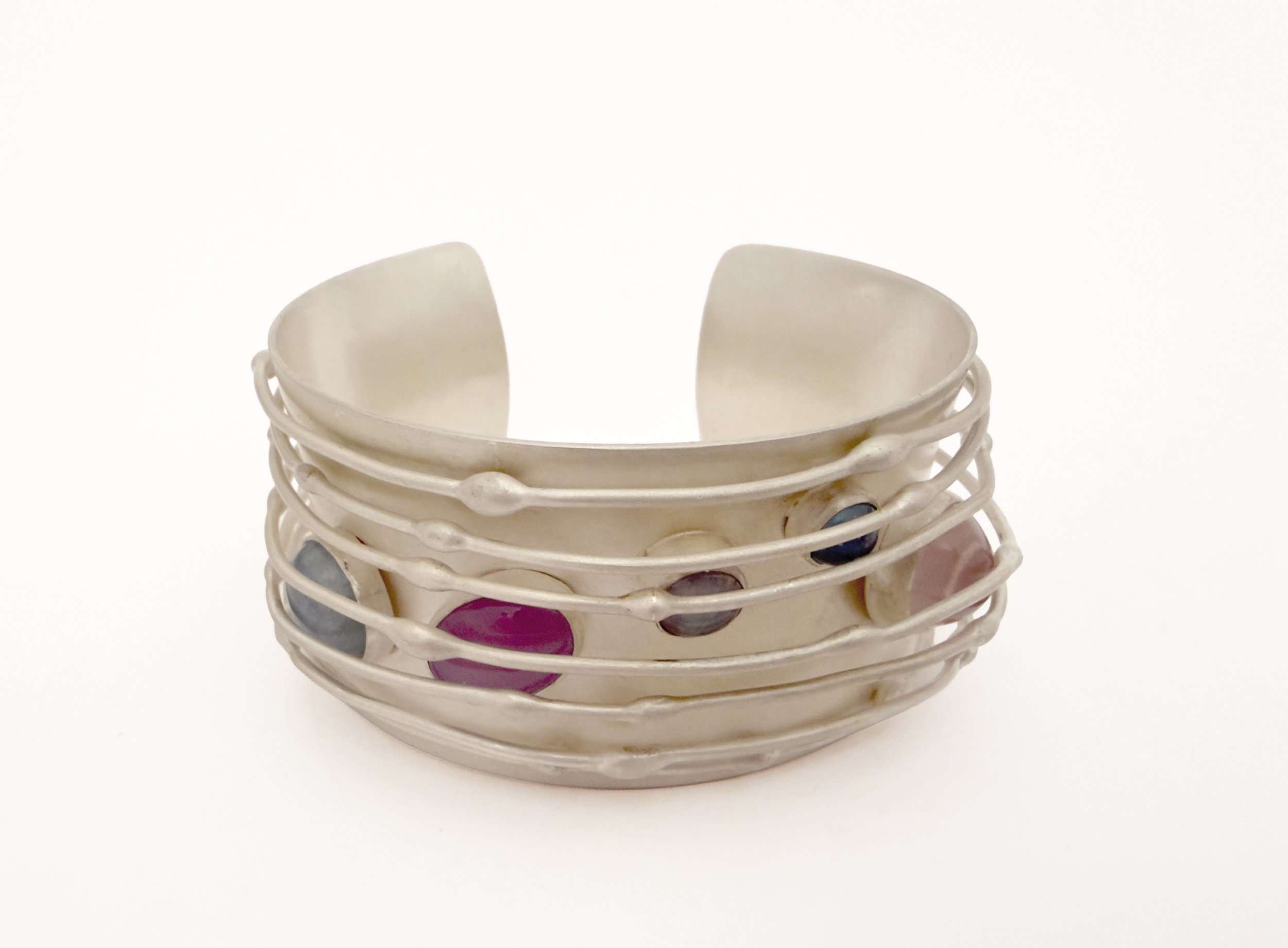 breathe 27 (cuff bracelet)
recycled silver, rose quartz and star apotite from RJM donations, calcedony from estate sale, opal triplet and aquamarine recycled from RJM silver jewelry
2 2/3" x 2 ½" x 1 ¼"
2026