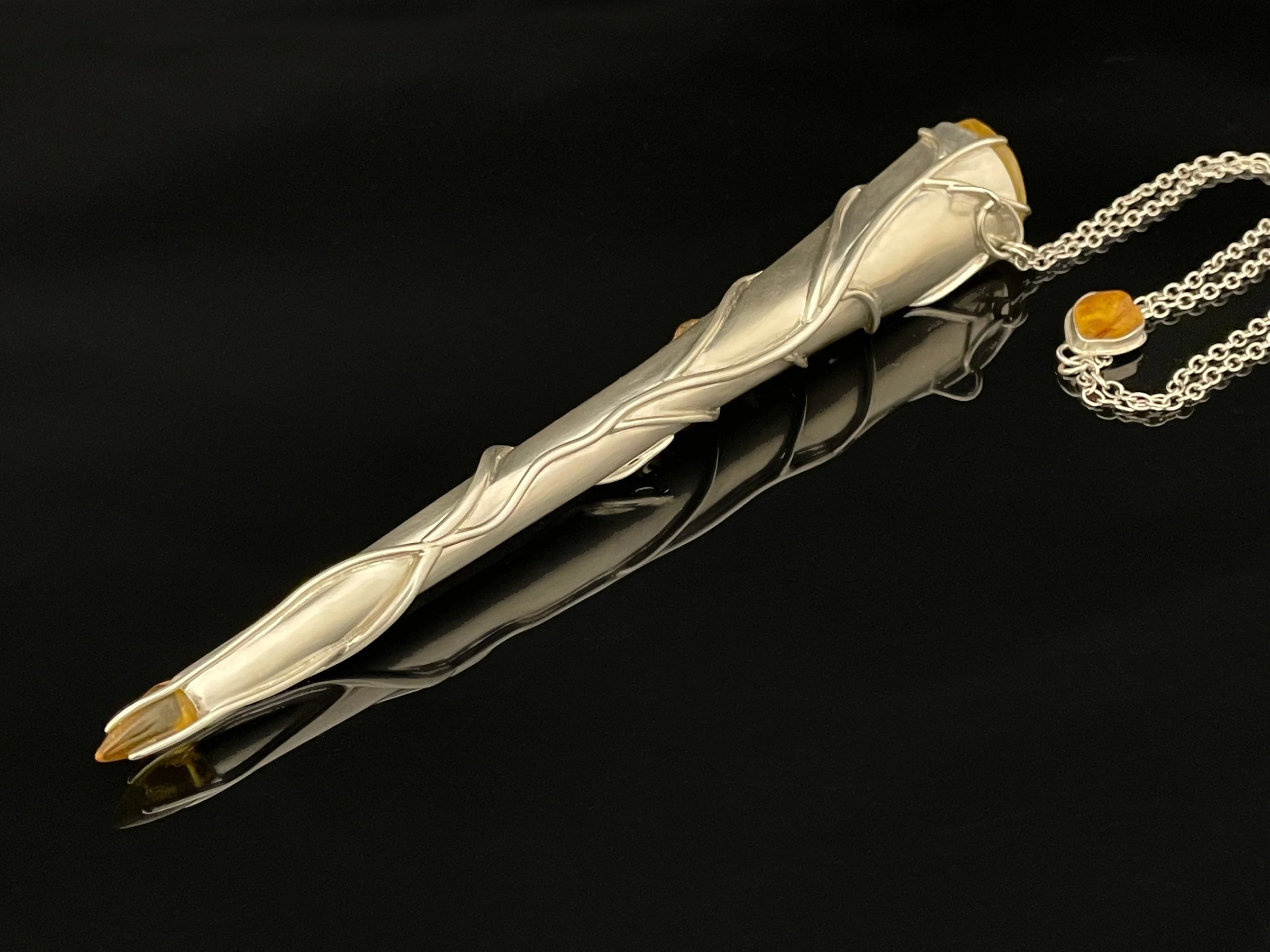 Amber Torah Pointer; sterling silver, Baltic amber, 8 1/4" x 1 3/4" x 1", 2022; commissioned for private collection