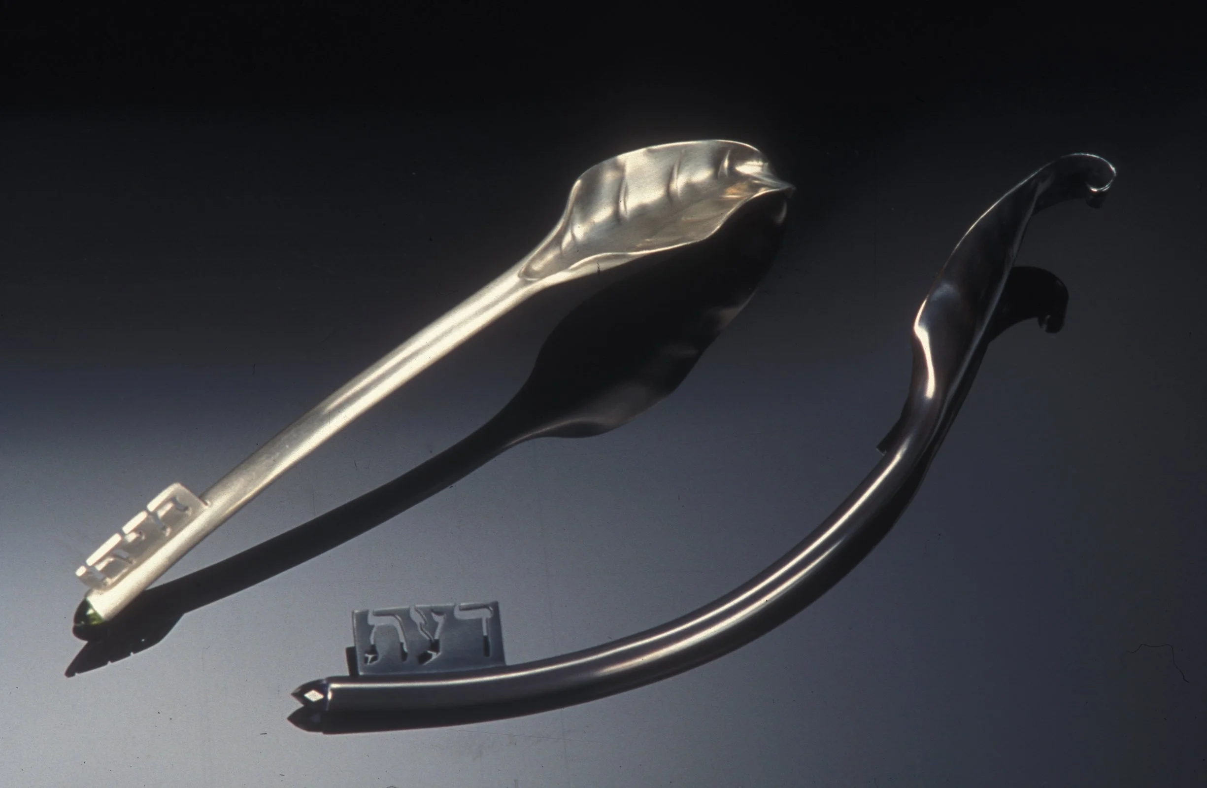 Key to the Tree of Life (Torah pointer), Key to the Tree of Knowledge (Torah pointer); sterling silver, peridot, iolite, 6" x 1" x 1"; 6 3/4" x 1 1/8" x 1 5/8", photographed by Jim Wildeman, 2001