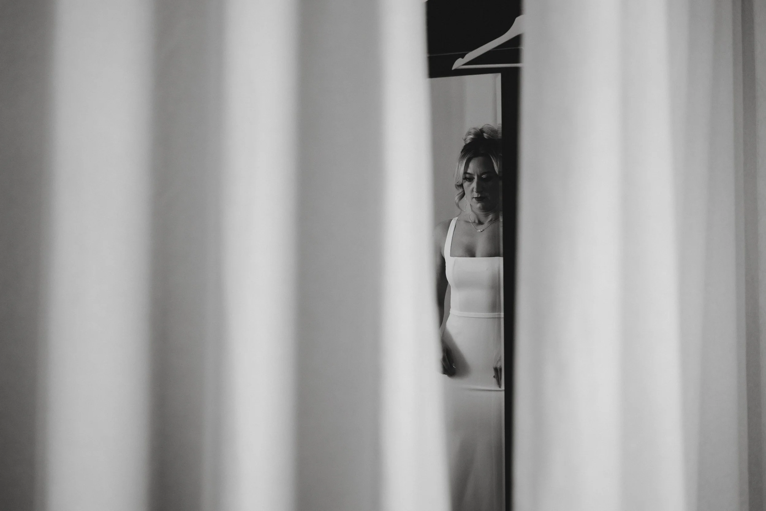 de reveal to bridesmaids at Netley Hall during a winter wedding morning