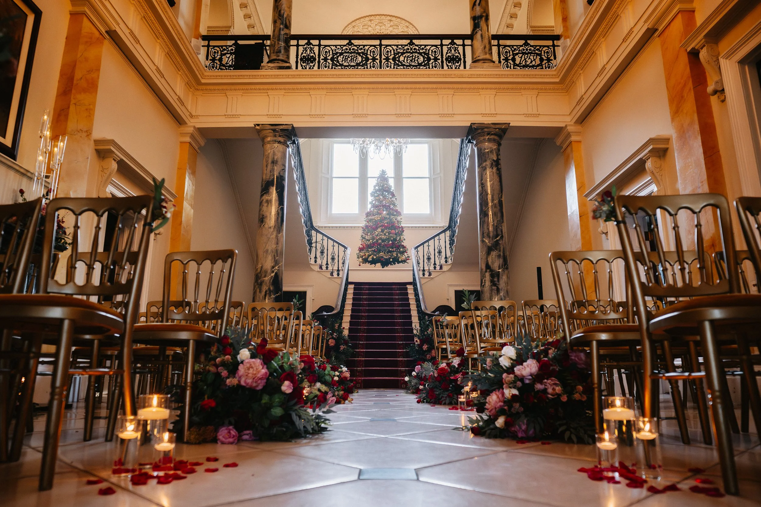Winter wedding ceremony at Netley Hall, festive touches and a beautiful Christmas tree