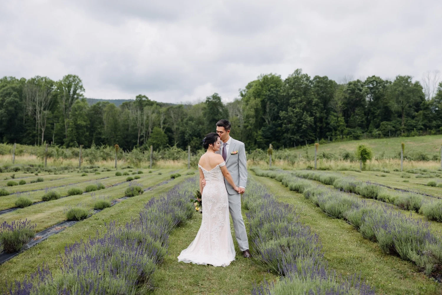 Bride and groom in a lavender field