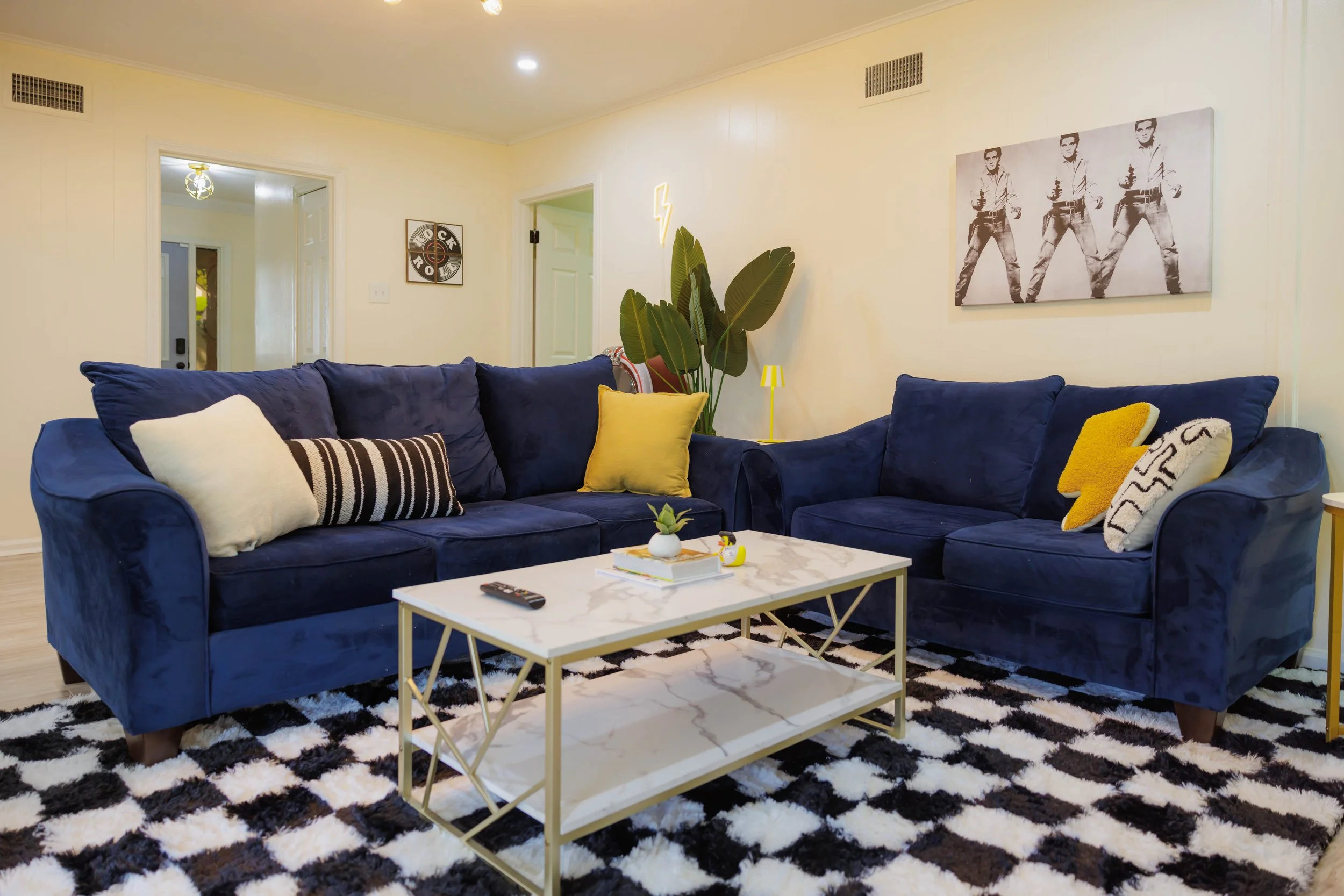 A warm and comfortable living space with Memphis-inspired details, designed for relaxing evenings, remote work, and extended stays in Memphis.