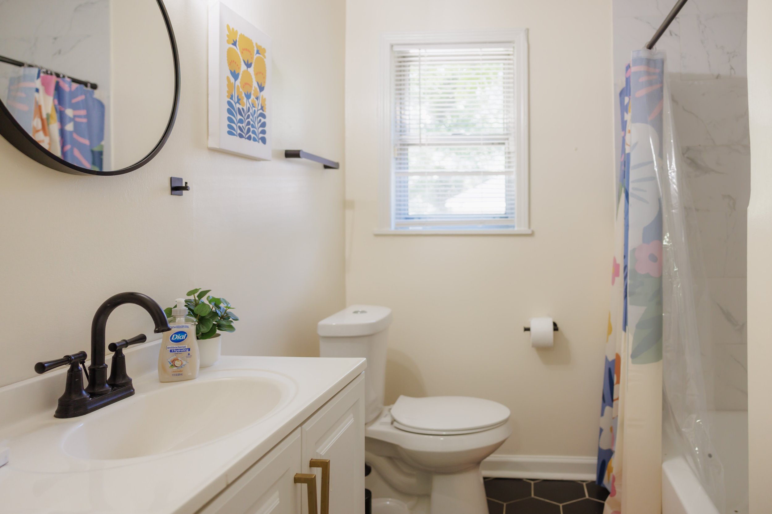 Bright and refreshed bathrooms stocked for comfortable extended stays.