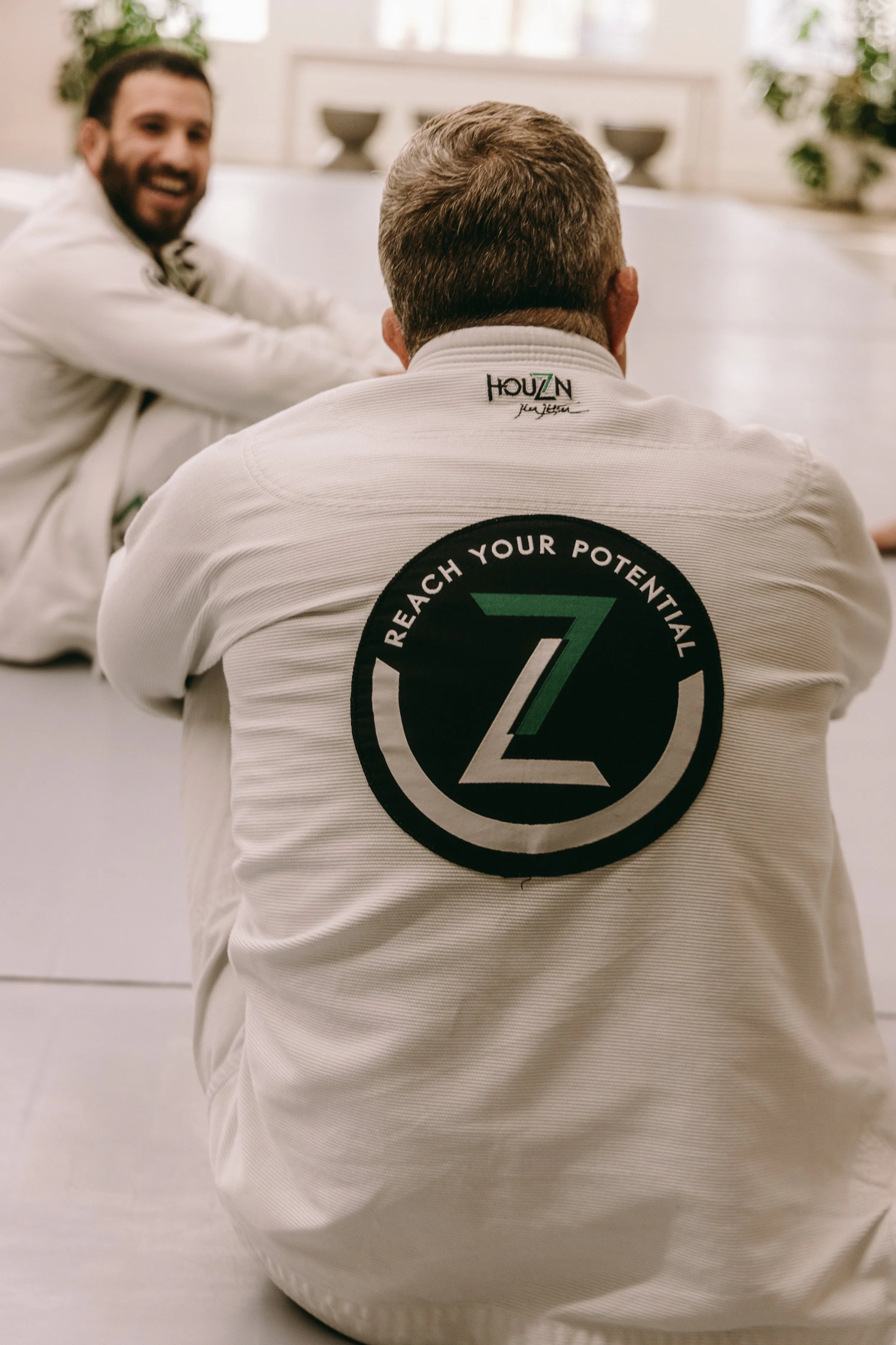 Houzn Jiu Jitsu Academy students training together, building accountability and connection