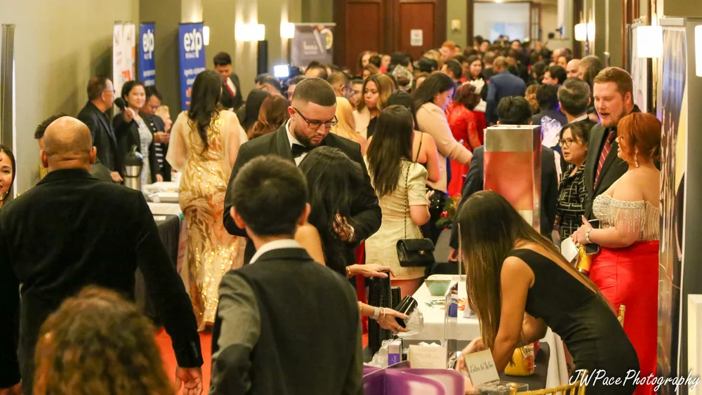 VCCH members and partners networking with sponsor booths