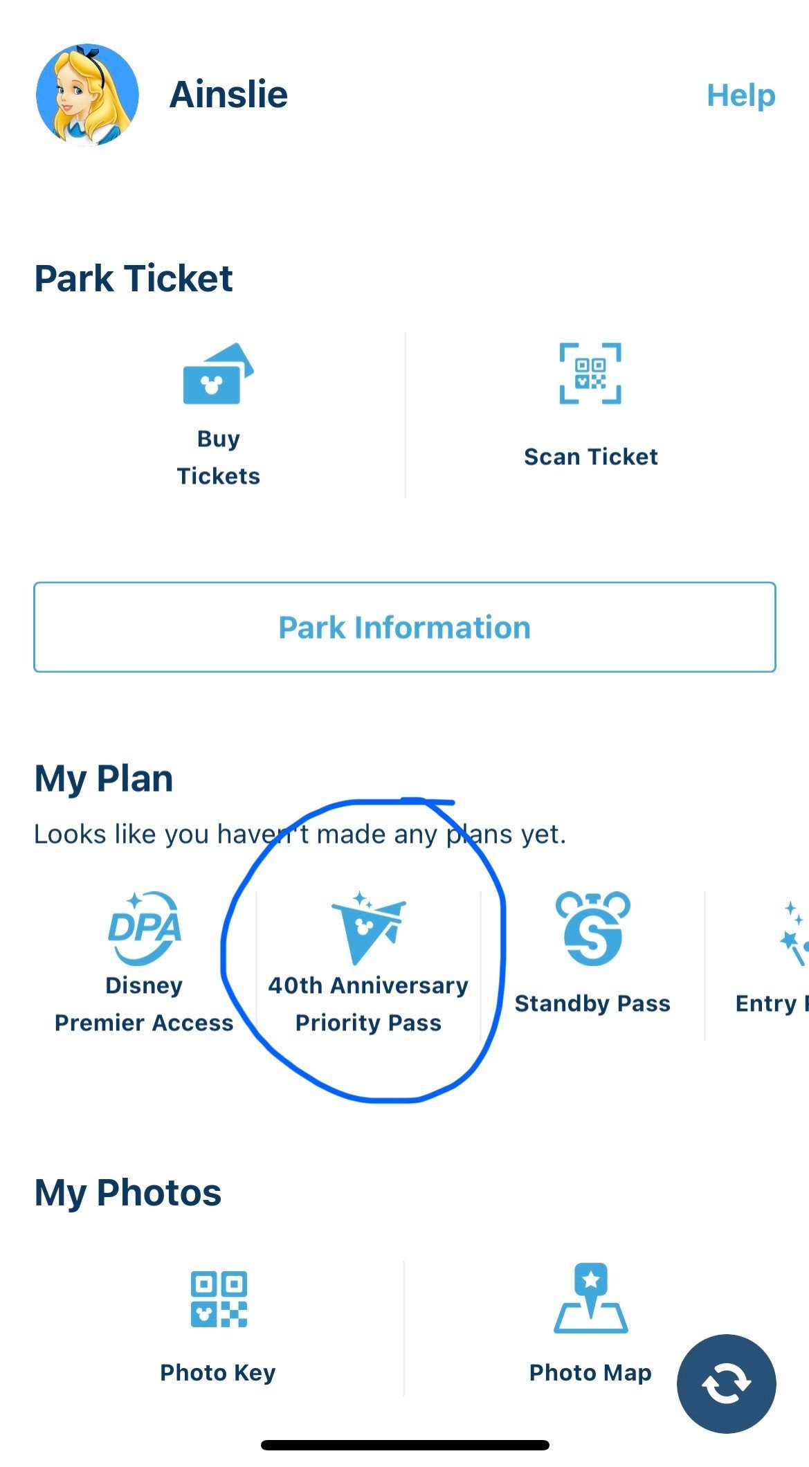 Mobile app screen showing options for park tickets, including buy tickets, scan ticket, park information, and special passes like 40th Anniversary Priority Pass, Disney Premier Access, Standby Pass, and entry key; also includes photo options for Photo Key and Photo Map.