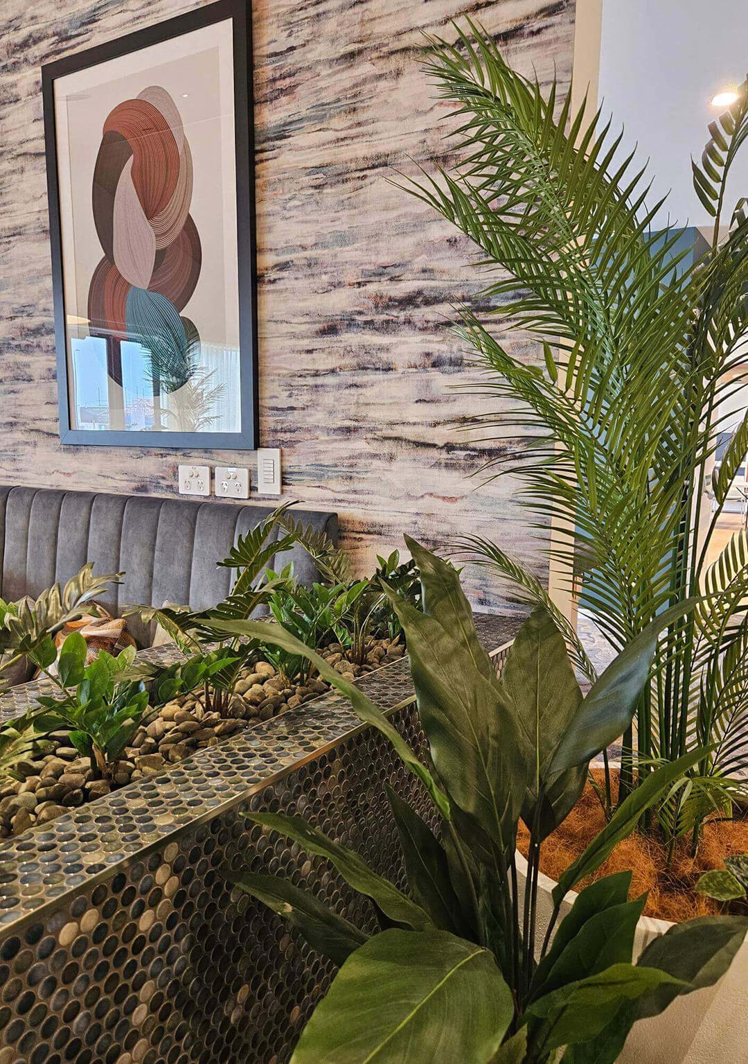 Indoor garden feature bringing biophilic design into a modern New Zealand home.