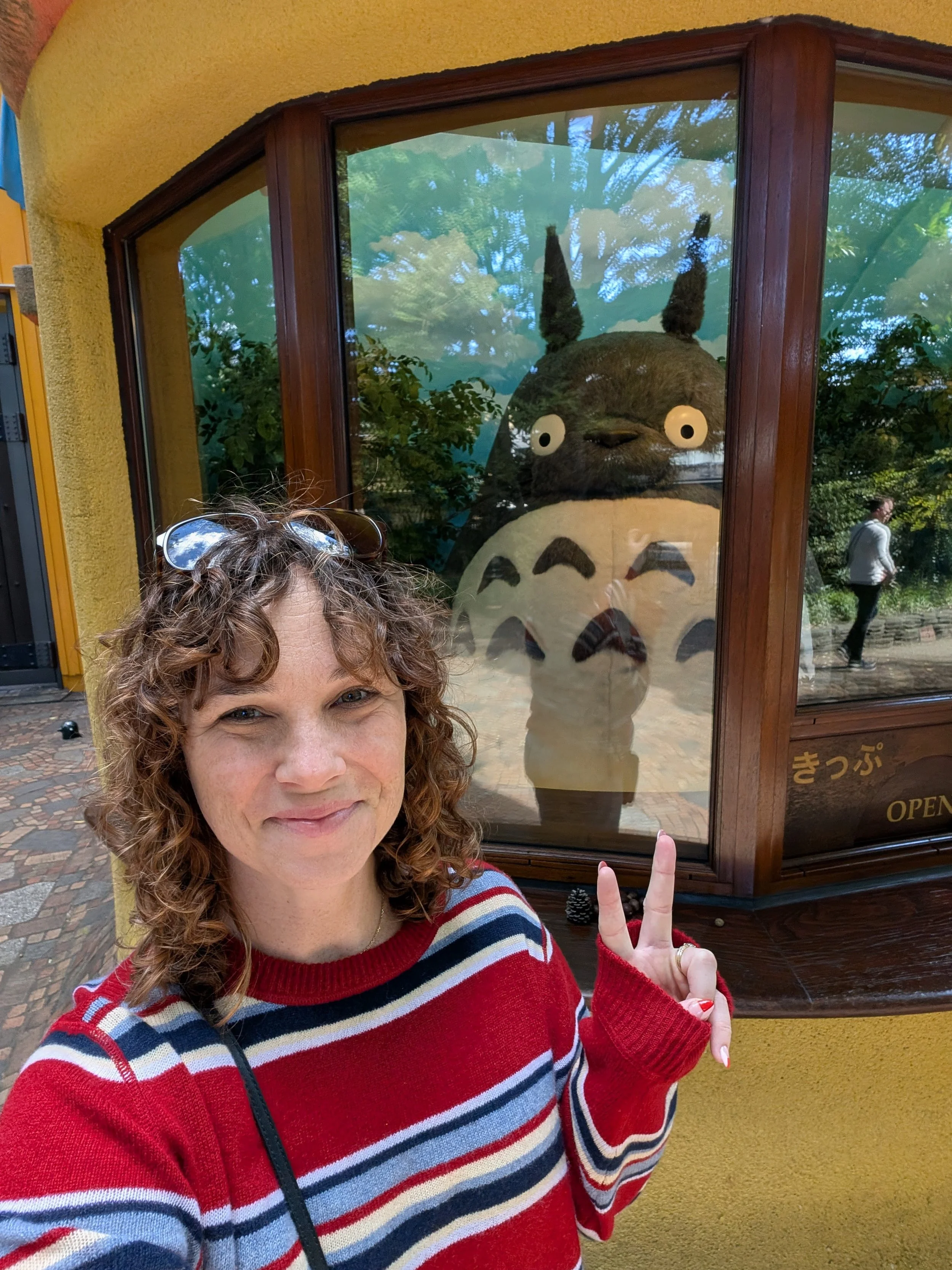 Shauna Mahoney standing in front of Totoro