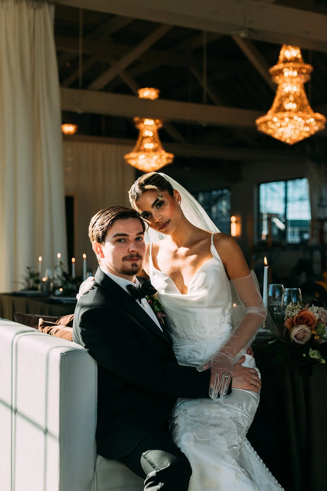 Wedding couple posing indoors at The Arbor Loft, wedding managed by Ember Event Management in Rochester, NY.